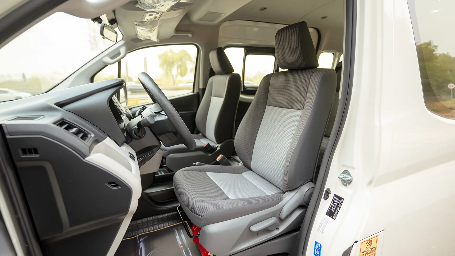 Used 2026 Toyota Hiace GL High Roof in White – Front Driver Side Cabin View for Sale at First Choice Cars Dubai Sharjah