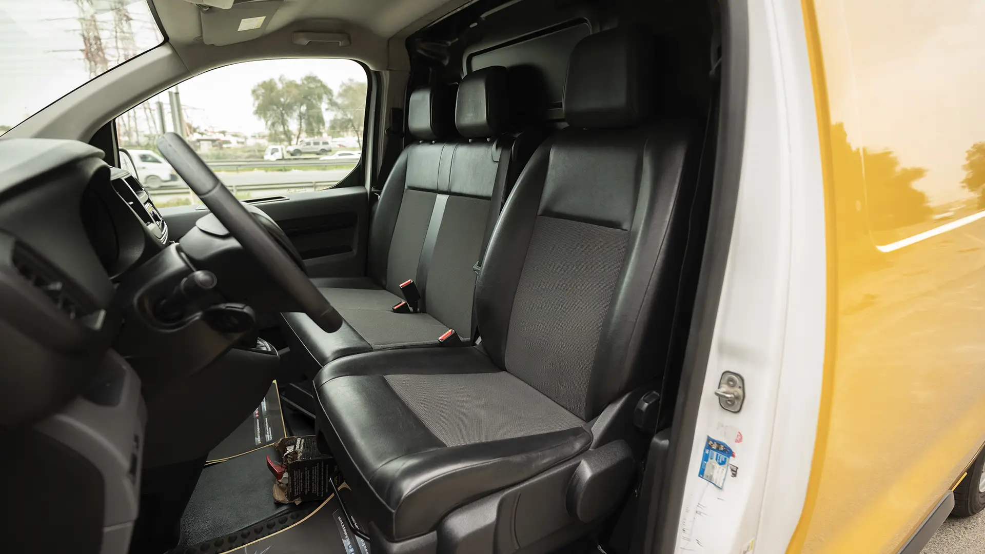 Used 2021 Peugeot Expert L3 in Yellow – Front Driver Side Cabin View for Sale at First Choice Cars Dubai Sharjah