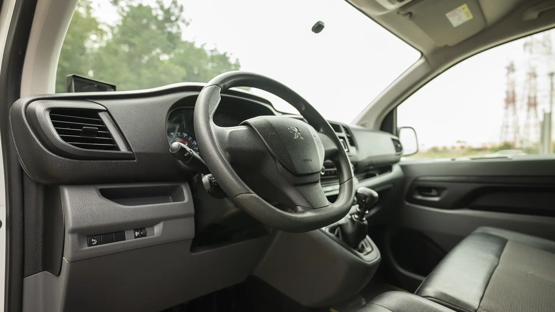 Used 2021 Peugeot Expert L3 in Yellow – Driver Side Dashboard & Steering View for Sale at First Choice Cars Dubai Sharjah