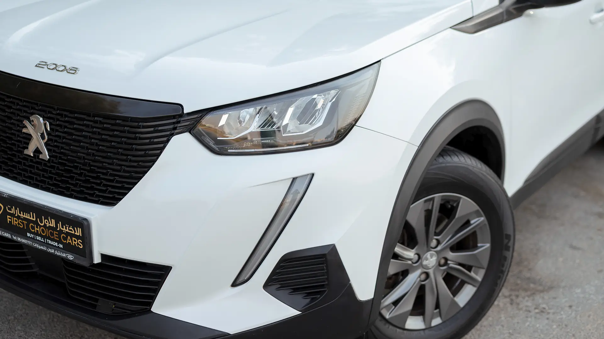 Used 2022 Peugeot 2008 Active in White – Headlight Close-up for Sale at First Choice Cars Dubai Sharjah
