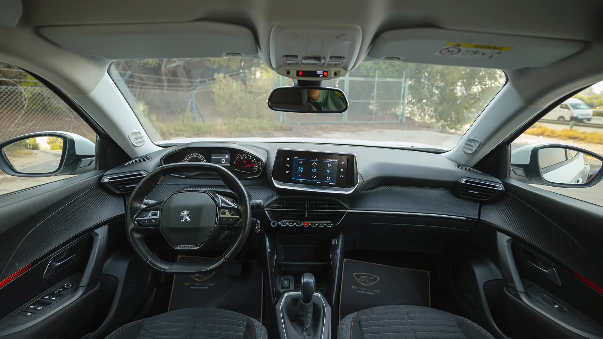 Used 2022 Peugeot 2008 Active in White – Front Cabin / Dashboard Full View for Sale at First Choice Cars Dubai Sharjah