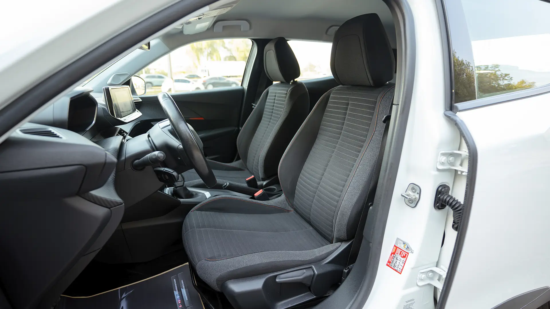 Used 2022 Peugeot 2008 Active in White – Front Driver Side Cabin View for Sale at First Choice Cars Dubai Sharjah