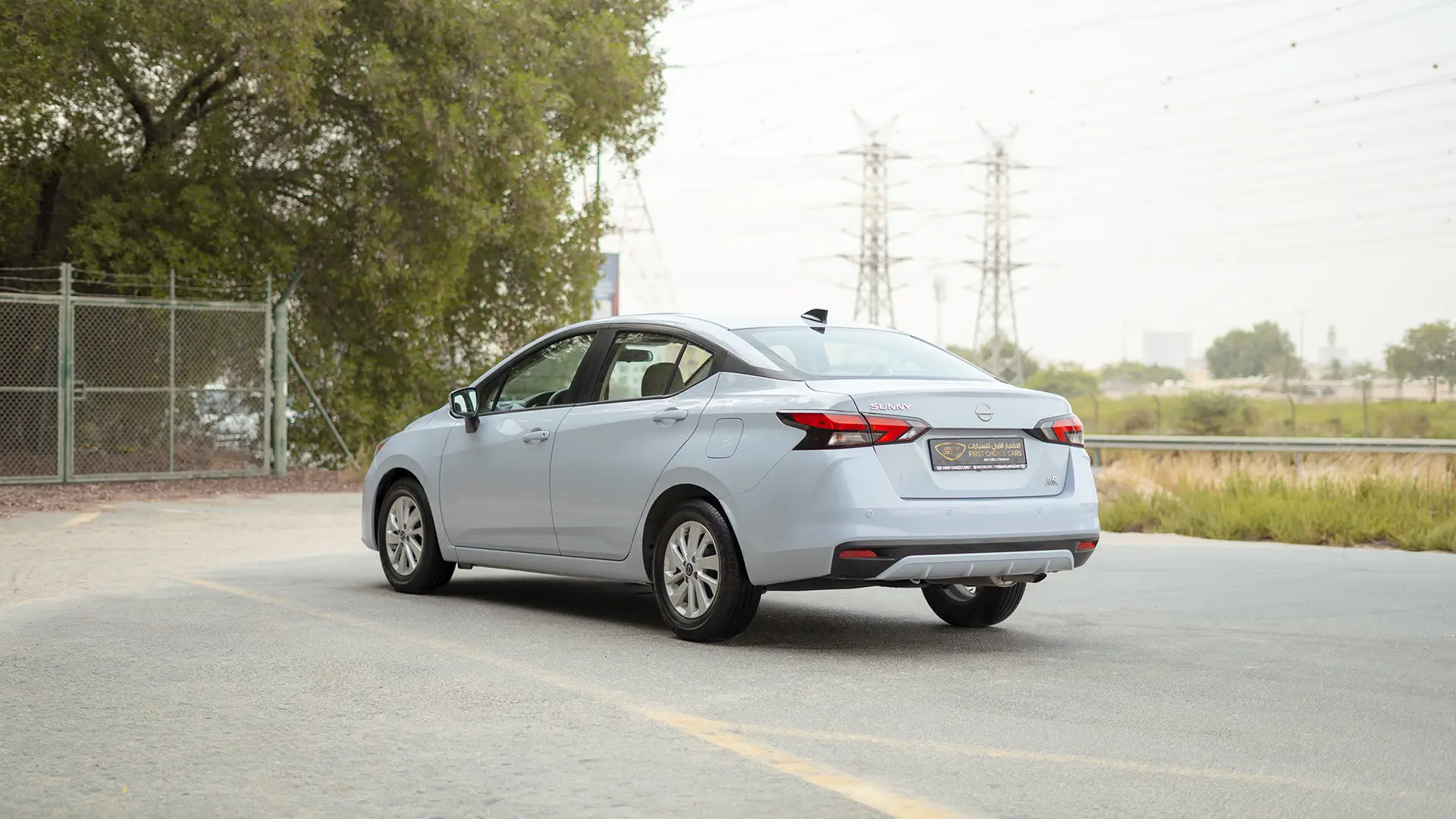 Used 2024 Nissan Sunny S in Grey – Left Back Diagonal (45°) View for Sale at First Choice Cars Dubai Sharjah