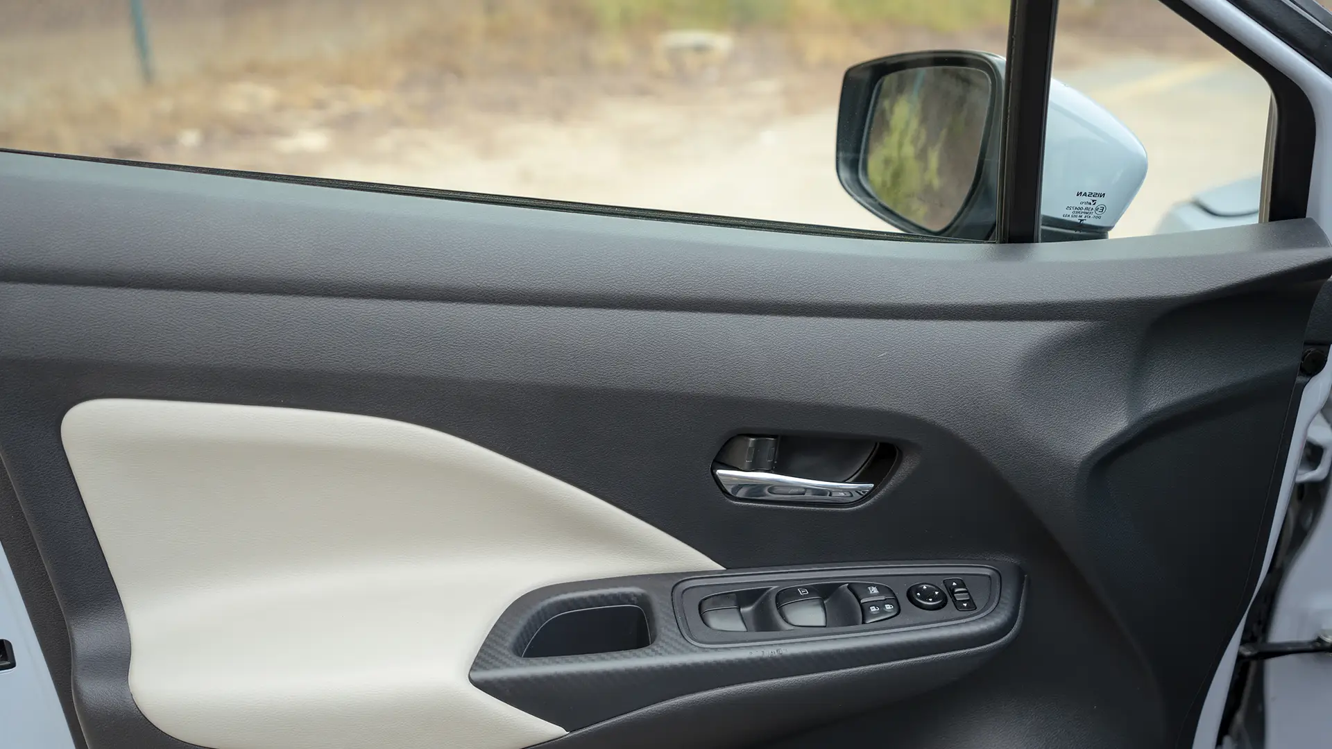 Used 2024 Nissan Sunny S in Grey – Driver Door Panel Full View for Sale at First Choice Cars Dubai Sharjah