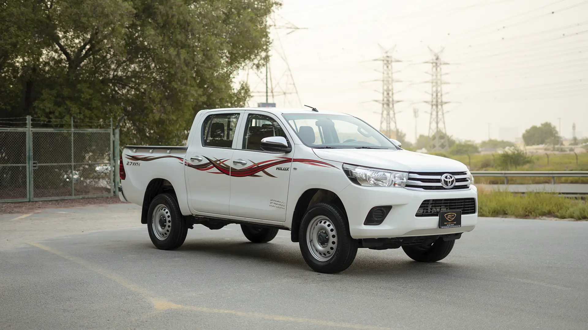 Used 2021 Toyota Hilux GLX Double Cabin in White – Right Front Diagonal (45°) View for Sale at First Choice Cars Dubai Sharjah
