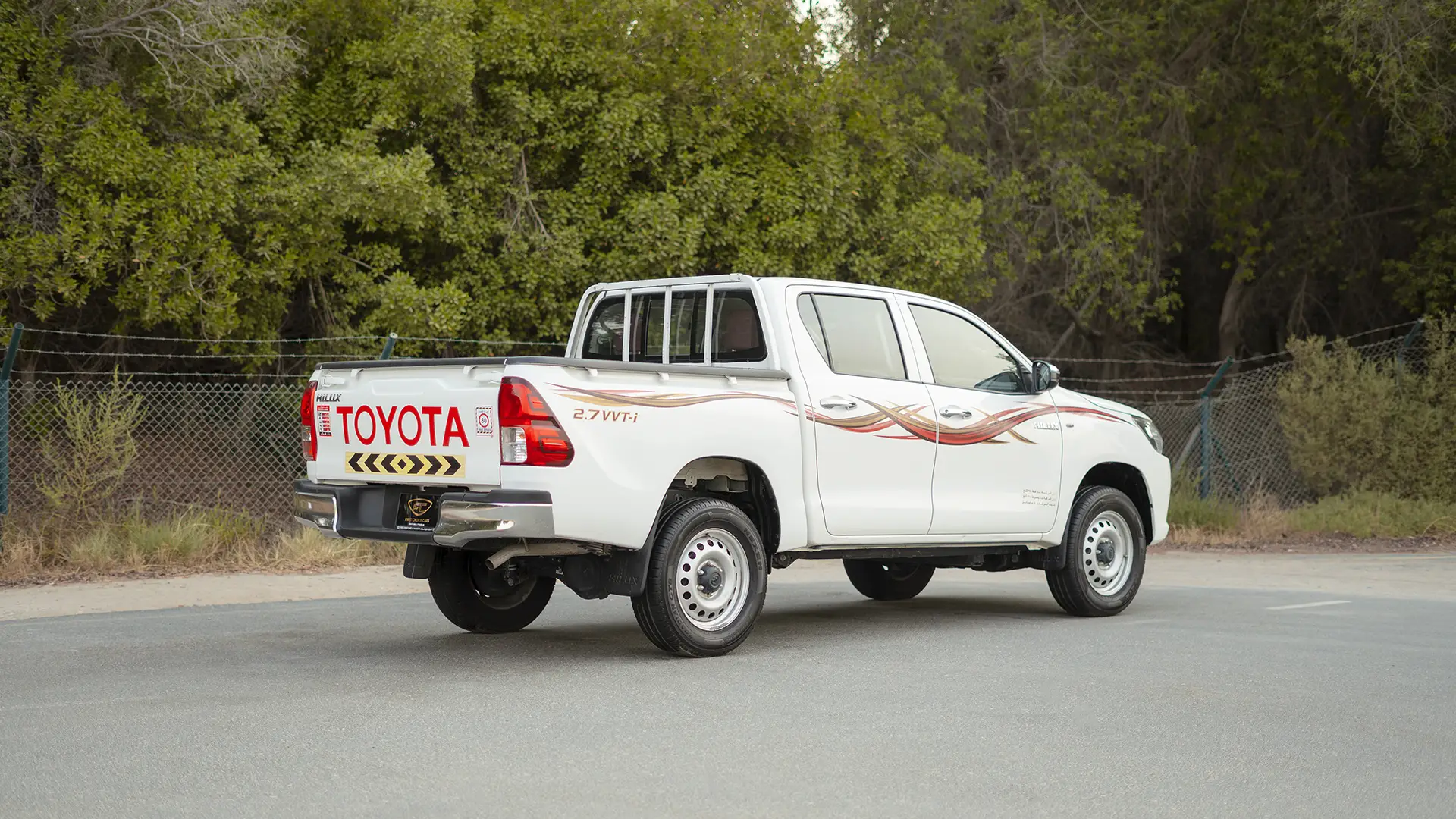Used 2021 Toyota Hilux GLX Double Cabin in White – Right Back Diagonal (45°) View for Sale at First Choice Cars Dubai Sharjah