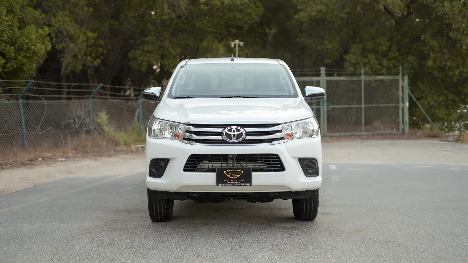 Used 2021 Toyota Hilux GLX Double Cabin in White – Front View for Sale at First Choice Cars Dubai Sharjah