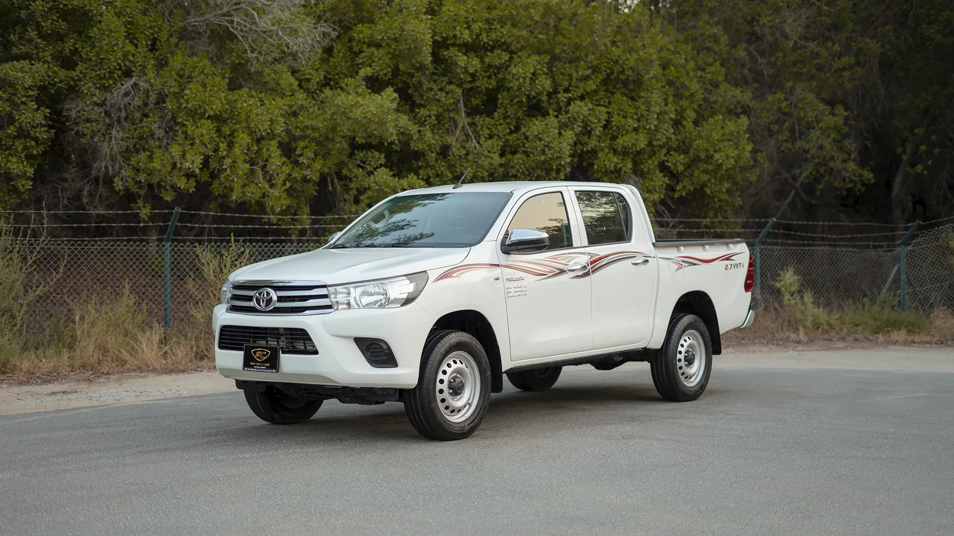 Used 2022 Toyota Hilux GLX Double Cabin in White – Left Front Diagonal (45°) View for Sale at First Choice Cars Dubai Sharjah