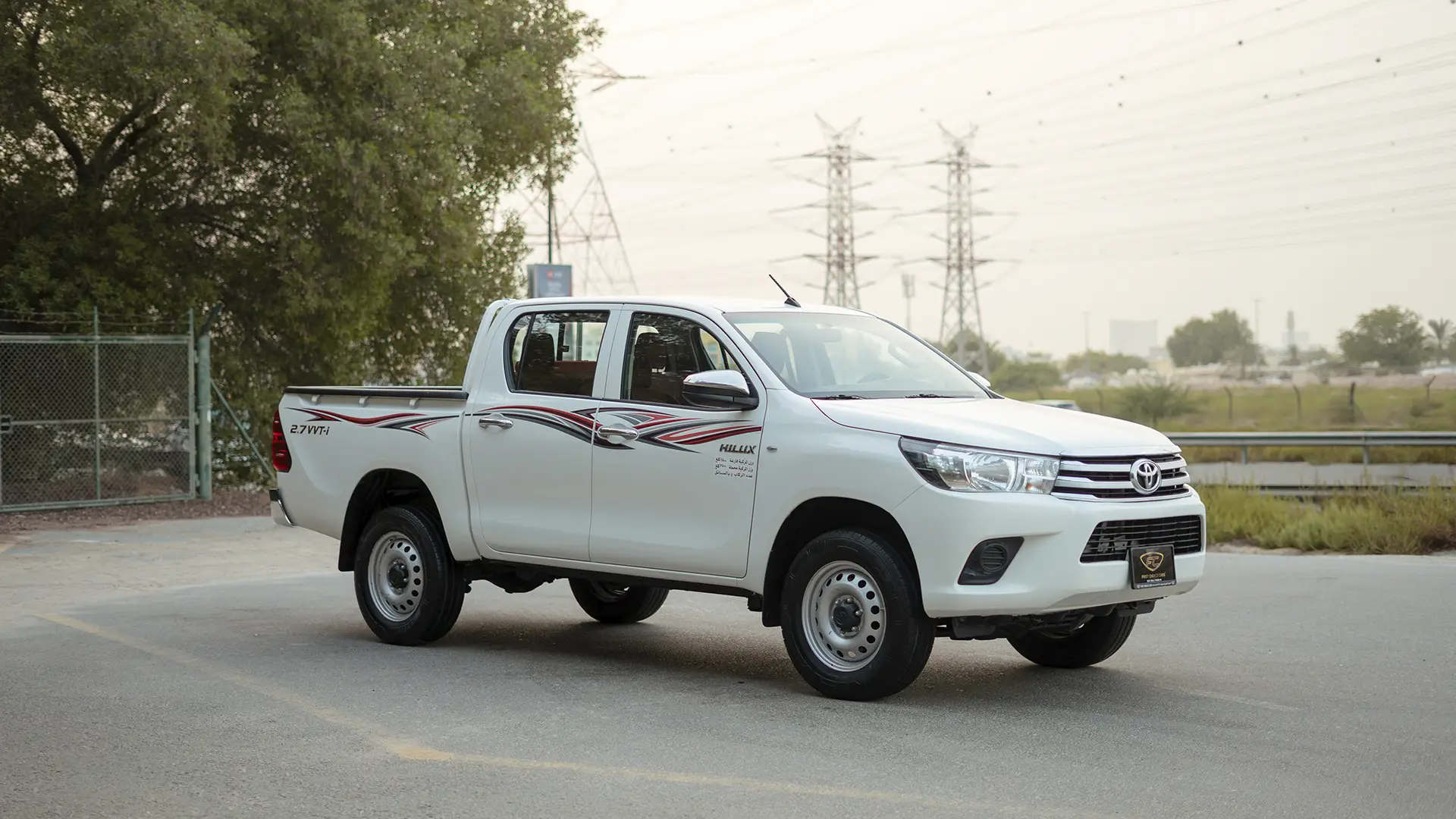 Used 2022 Toyota Hilux GLX Double Cabin in White – Right Front Diagonal (45°) View for Sale at First Choice Cars Dubai Sharjah