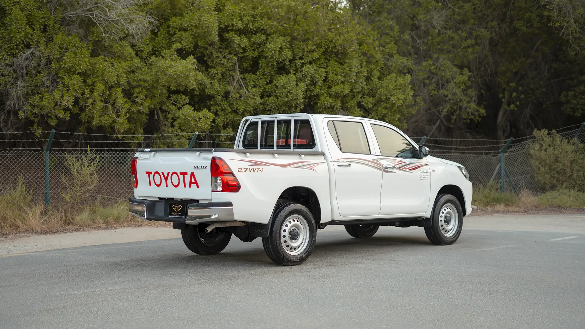 Used 2022 Toyota Hilux GLX Double Cabin in White – Right Back Diagonal (45°) View for Sale at First Choice Cars Dubai Sharjah