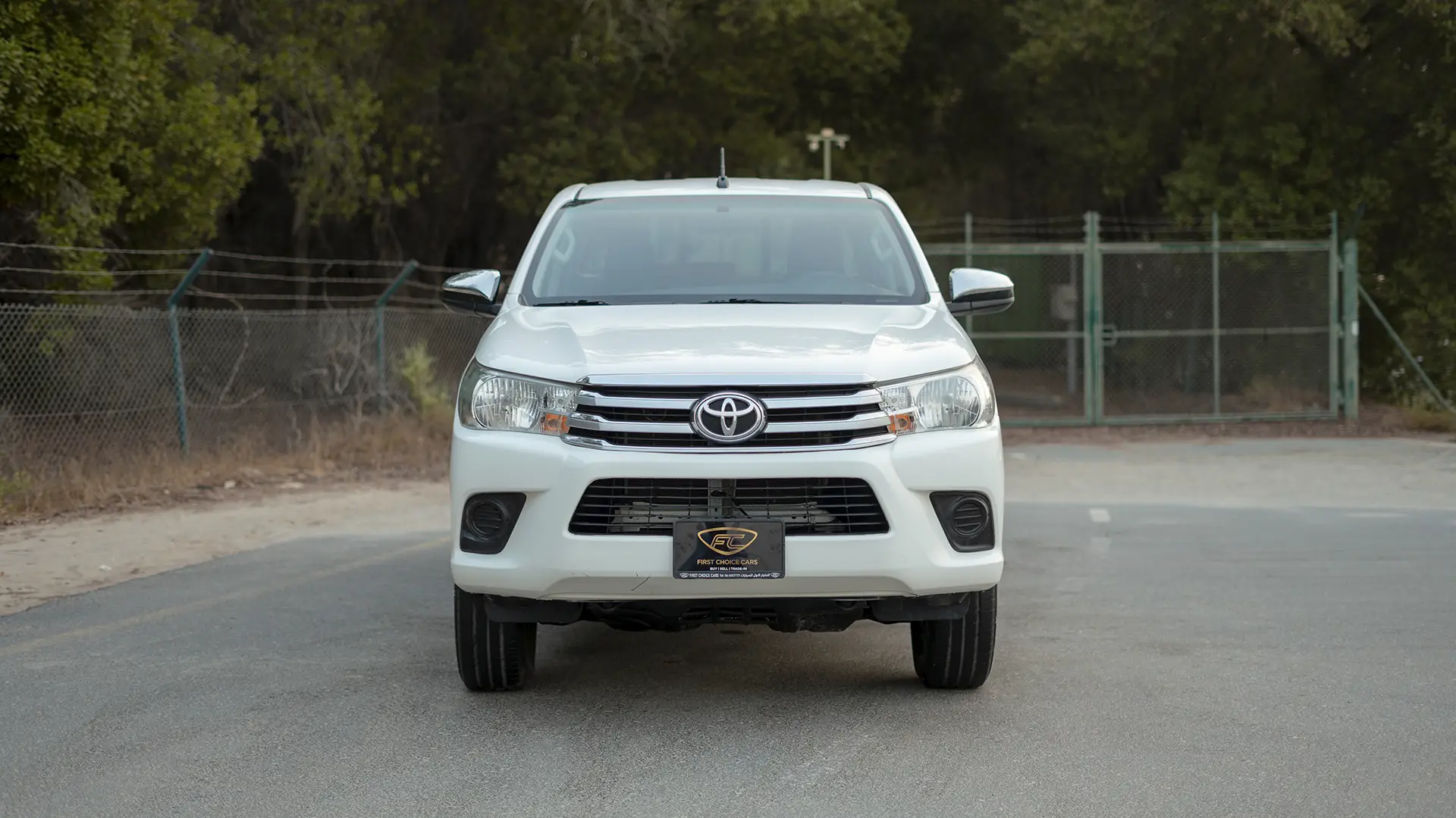 Used 2022 Toyota Hilux GLX Double Cabin in White – Front View for Sale at First Choice Cars Dubai Sharjah