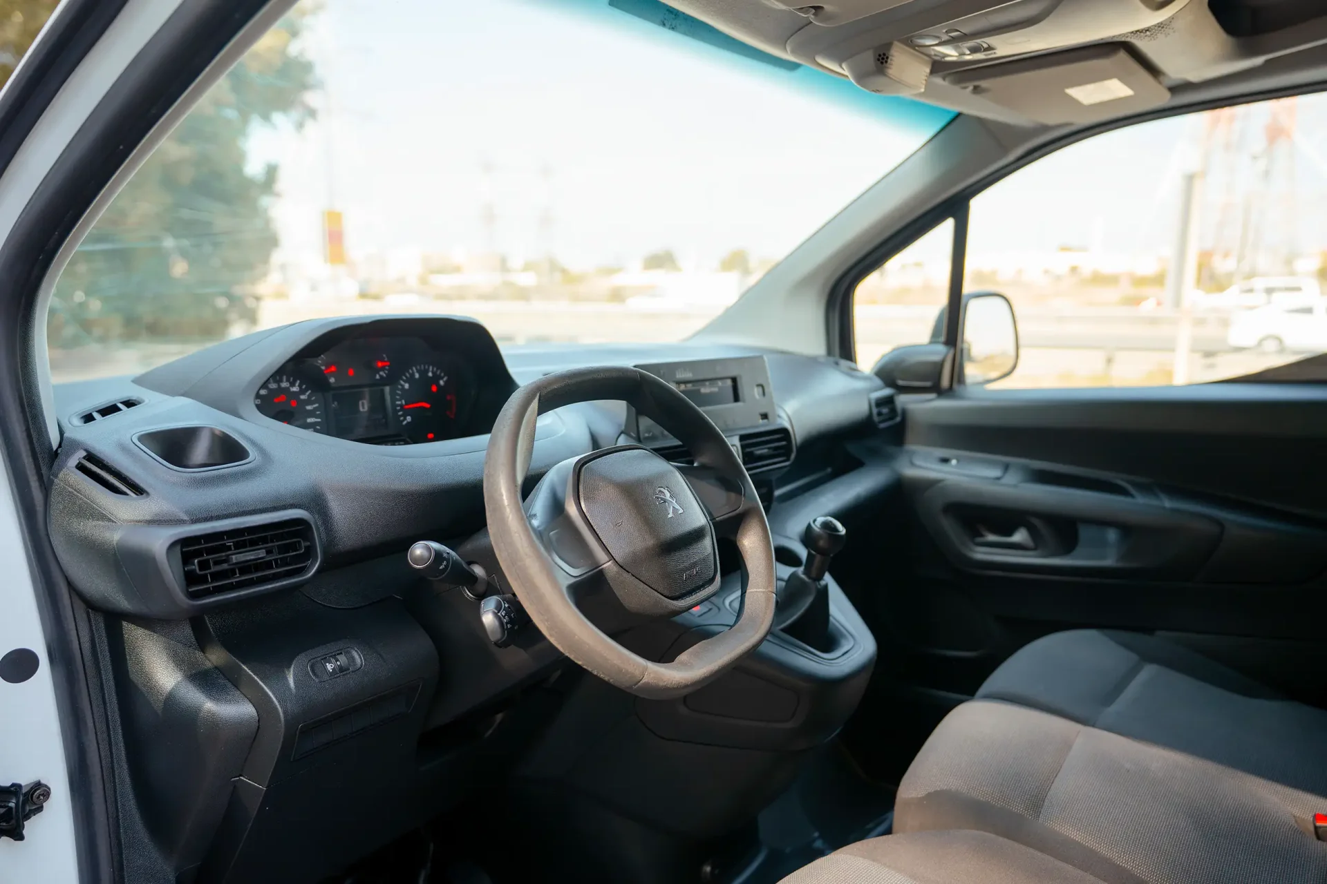 Used 2020 Peugeot Partner Standard in White – Driver Side Dashboard & Steering View for Sale at First Choice Cars Dubai Sharjah