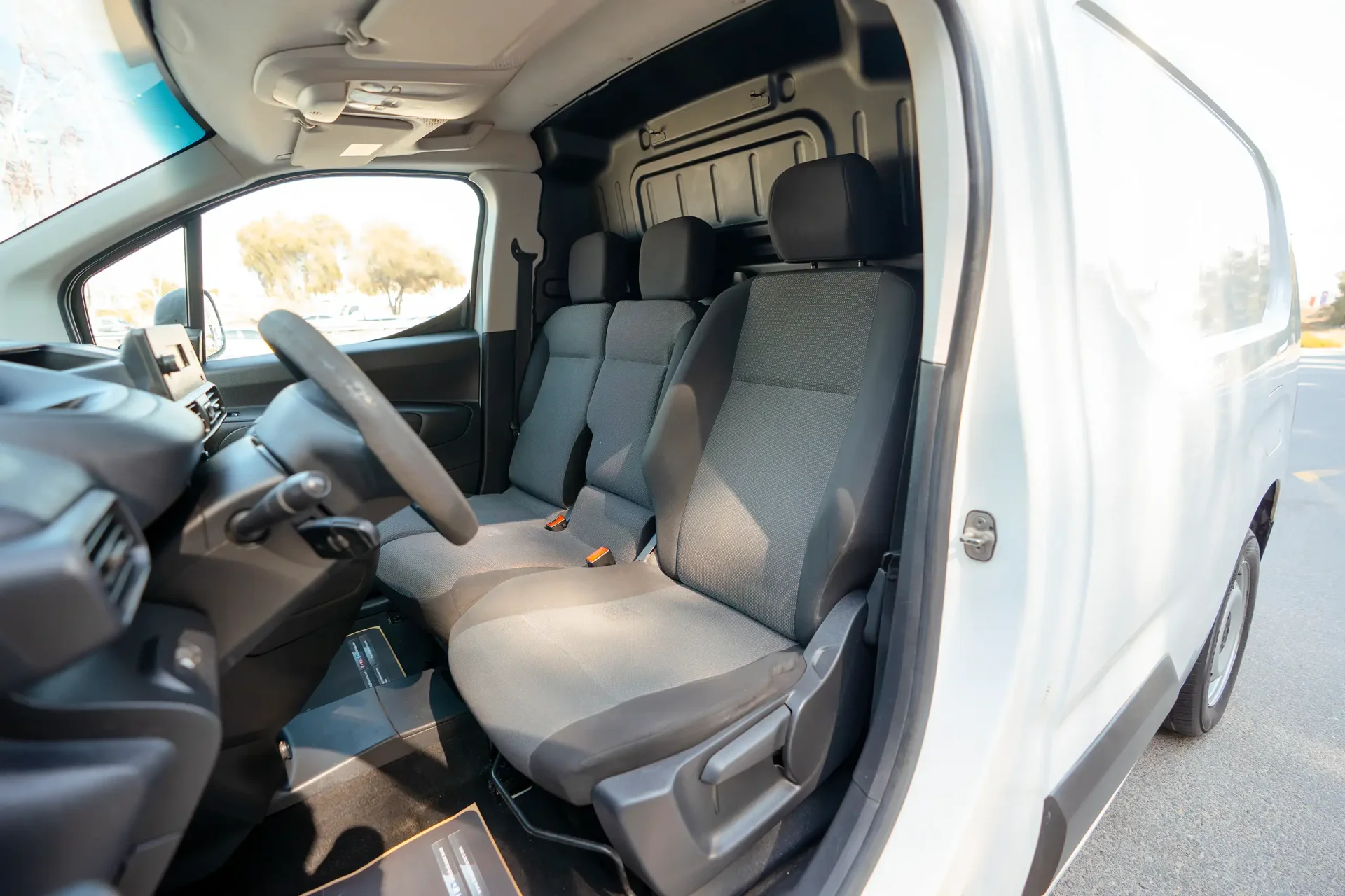 Used 2022 Peugeot Partner Standard in White – Front Driver Side Cabin View for Sale at First Choice Cars Dubai Sharjah
