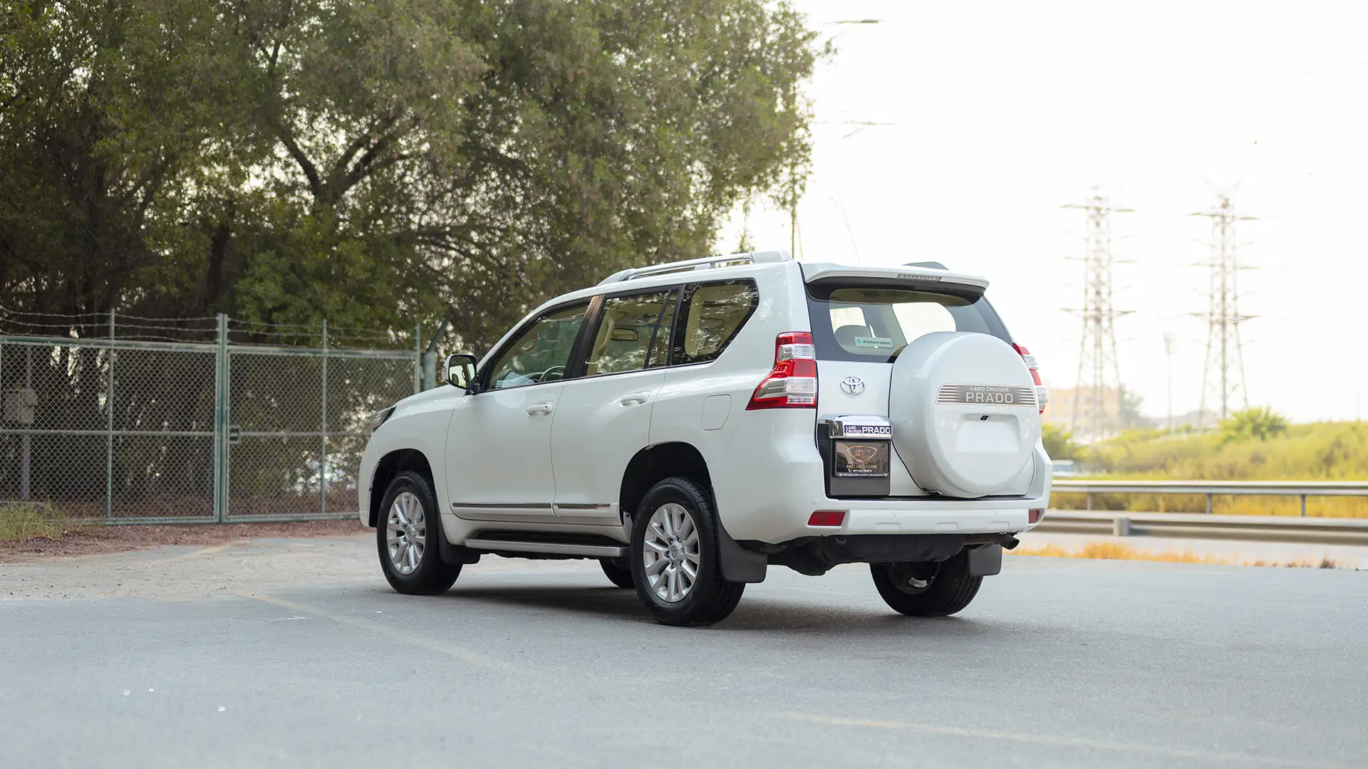 Used 2016 Toyota Prado VXR in White – Left Back Diagonal (45°) View for Sale at First Choice Cars Dubai Sharjah