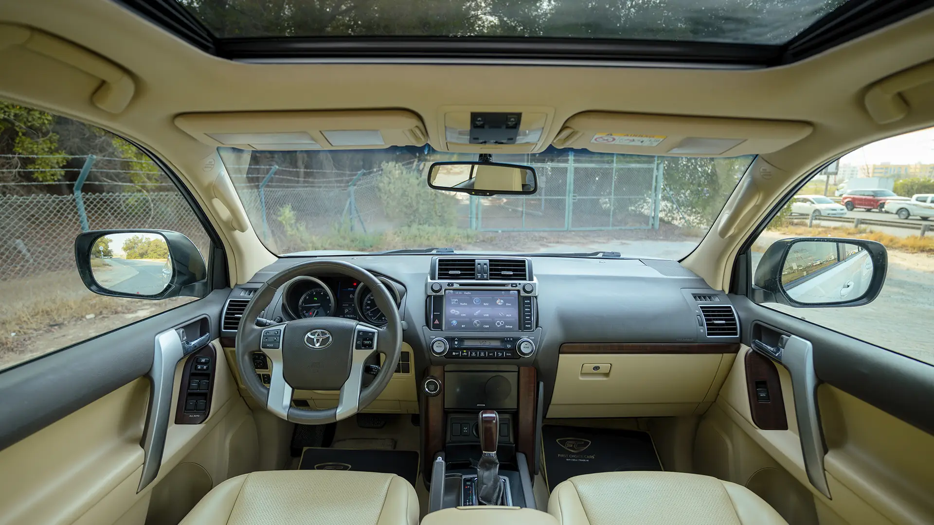 Used 2016 Toyota Prado VXR in White – Front Cabin / Dashboard Full View for Sale at First Choice Cars Dubai Sharjah