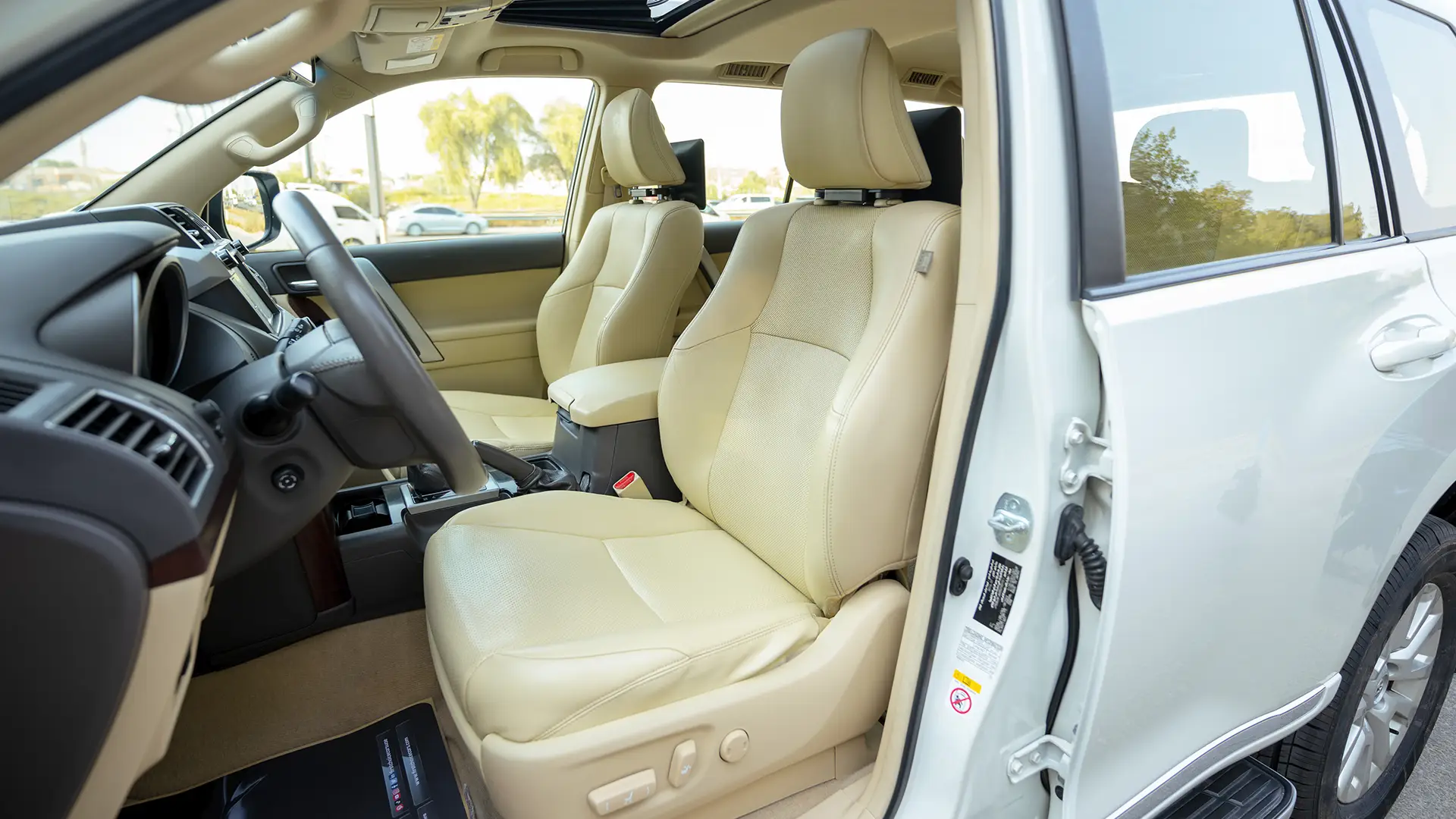 Used 2016 Toyota Prado VXR in White – Front Driver Side Cabin View for Sale at First Choice Cars Dubai Sharjah