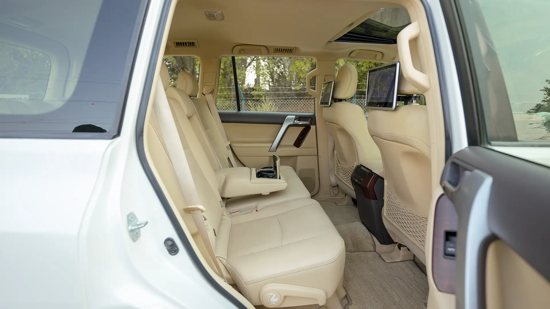 Used 2016 Toyota Prado VXR in White – Rear Passenger Side Cabin View for Sale at First Choice Cars Dubai Sharjah