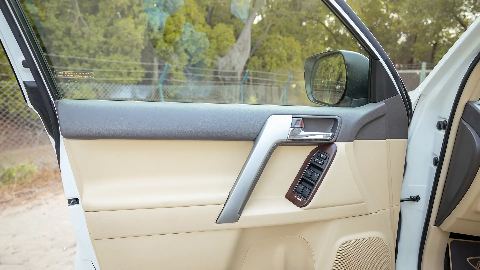 Used 2016 Toyota Prado VXR in White – Driver Door Panel Full View for Sale at First Choice Cars Dubai Sharjah