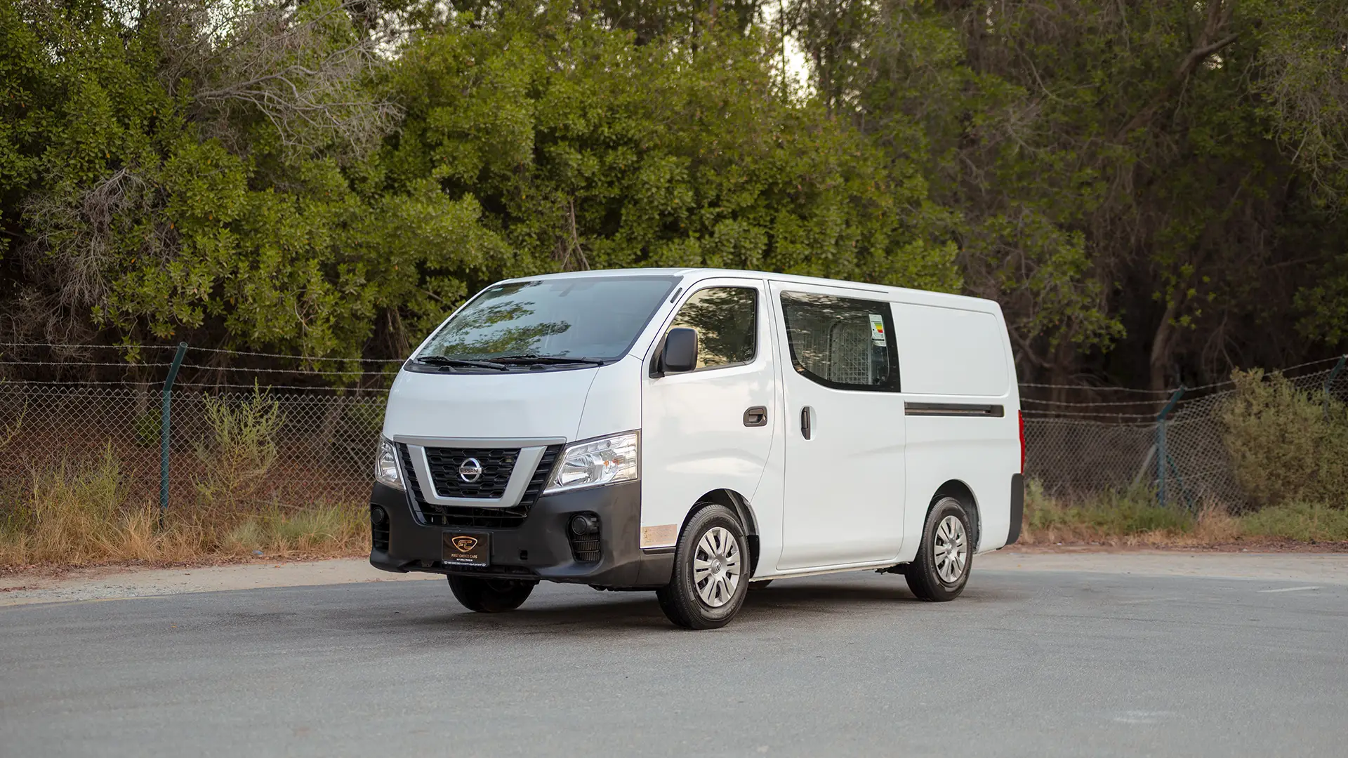 Used 2022 Nissan Urvan Standard Roof in White – Left Front Diagonal (45°) View for Sale at First Choice Cars Dubai Sharjah