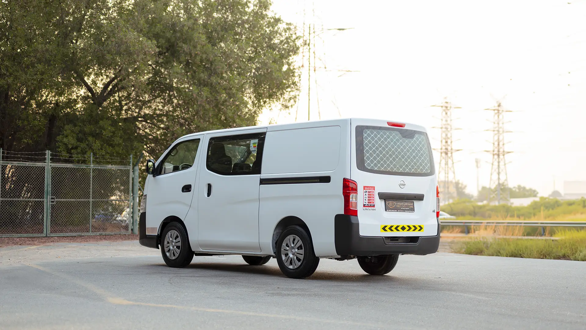 Used 2022 Nissan Urvan Standard Roof in White – Left Back Diagonal (45°) View for Sale at First Choice Cars Dubai Sharjah