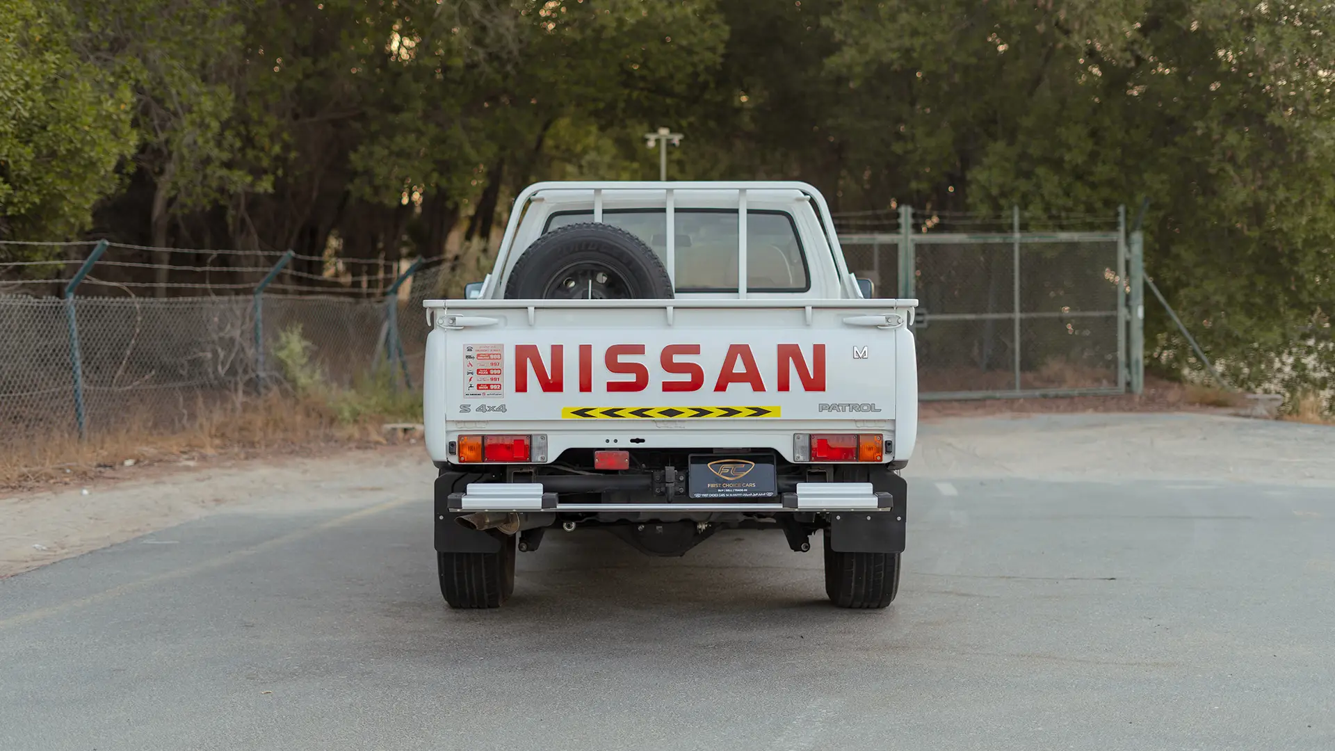 Used 2022 Nissan Patrol Pickup GL in White – Back/Rear View for Sale at First Choice Cars Dubai Sharjah