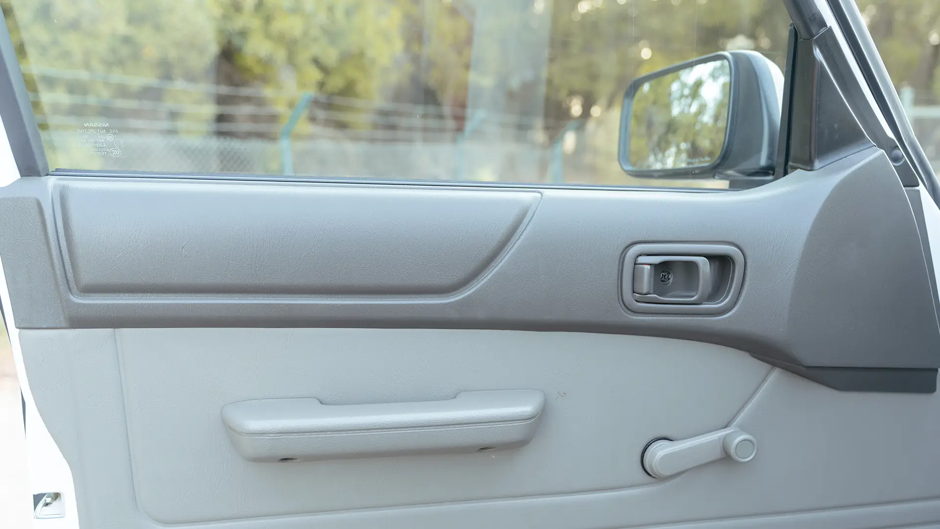 Used 2022 Nissan Patrol Pickup GL in White – Driver Door Panel Full View for Sale at First Choice Cars Dubai Sharjah