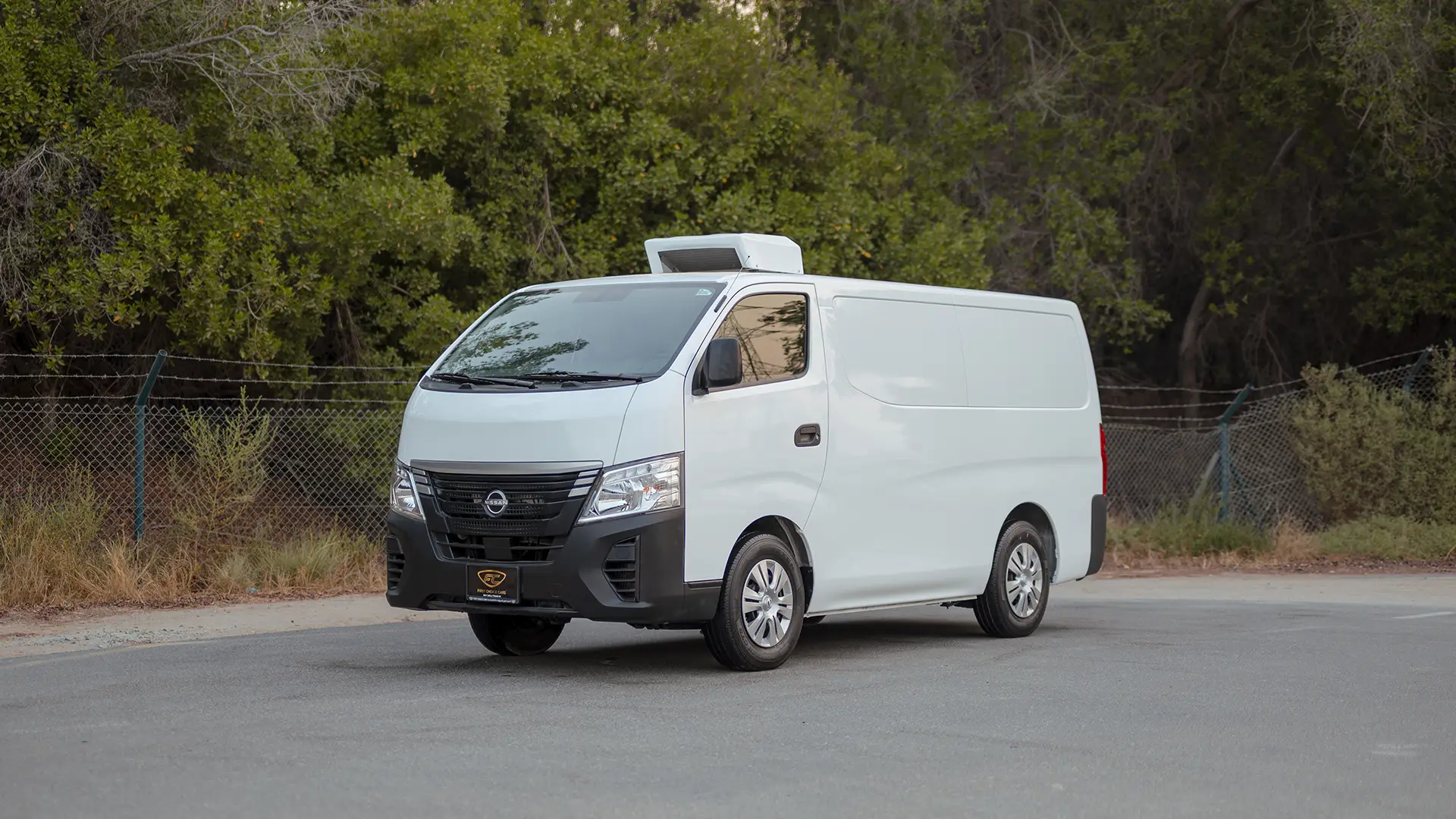 Used 2023 Nissan Urvan Standard Roof in White – Left Front Diagonal (45°) View for Sale at First Choice Cars Dubai Sharjah