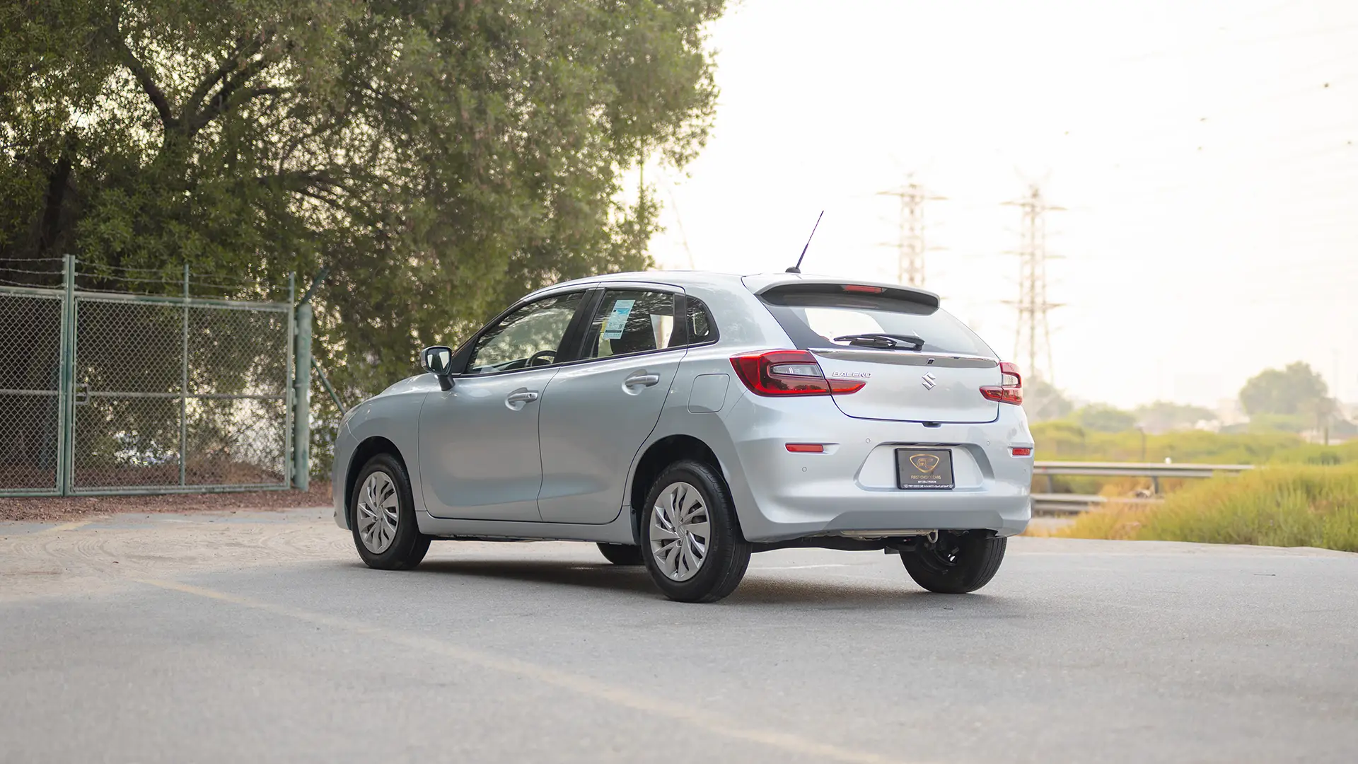Used 2025 Suzuki Baleno GL in Silver – Left Back Diagonal (45°) View for Sale at First Choice Cars Dubai Sharjah