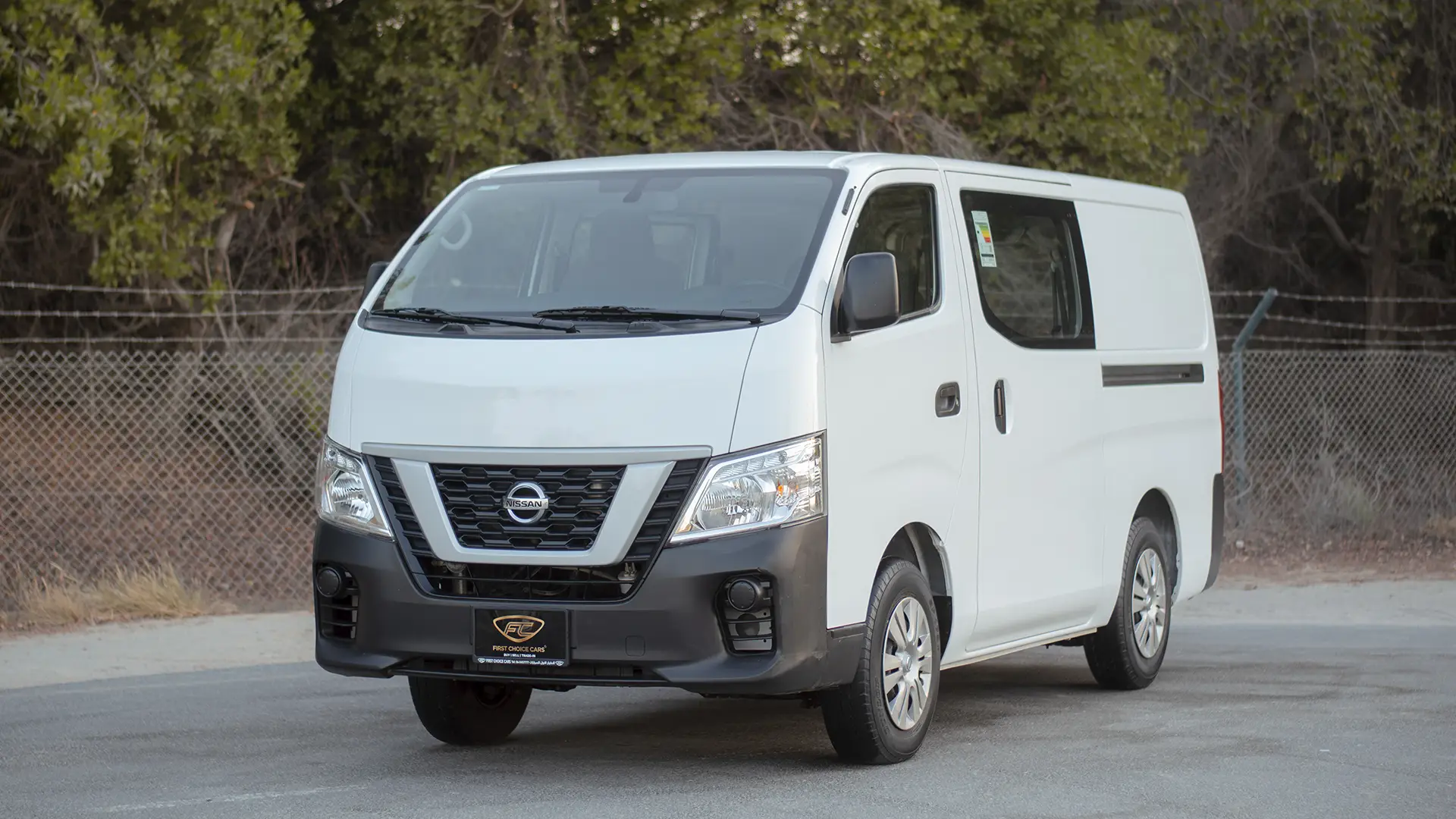 Used 2022 Nissan Urvan Standard Roof in White – Left Front Diagonal (45°) View for Sale at First Choice Cars Dubai Sharjah