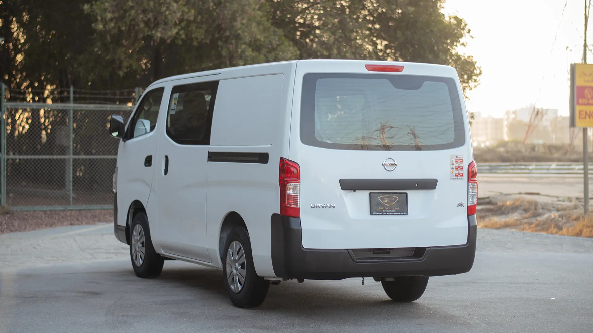 Used 2022 Nissan Urvan Standard Roof in White – Left Back Diagonal (45°) View for Sale at First Choice Cars Dubai Sharjah