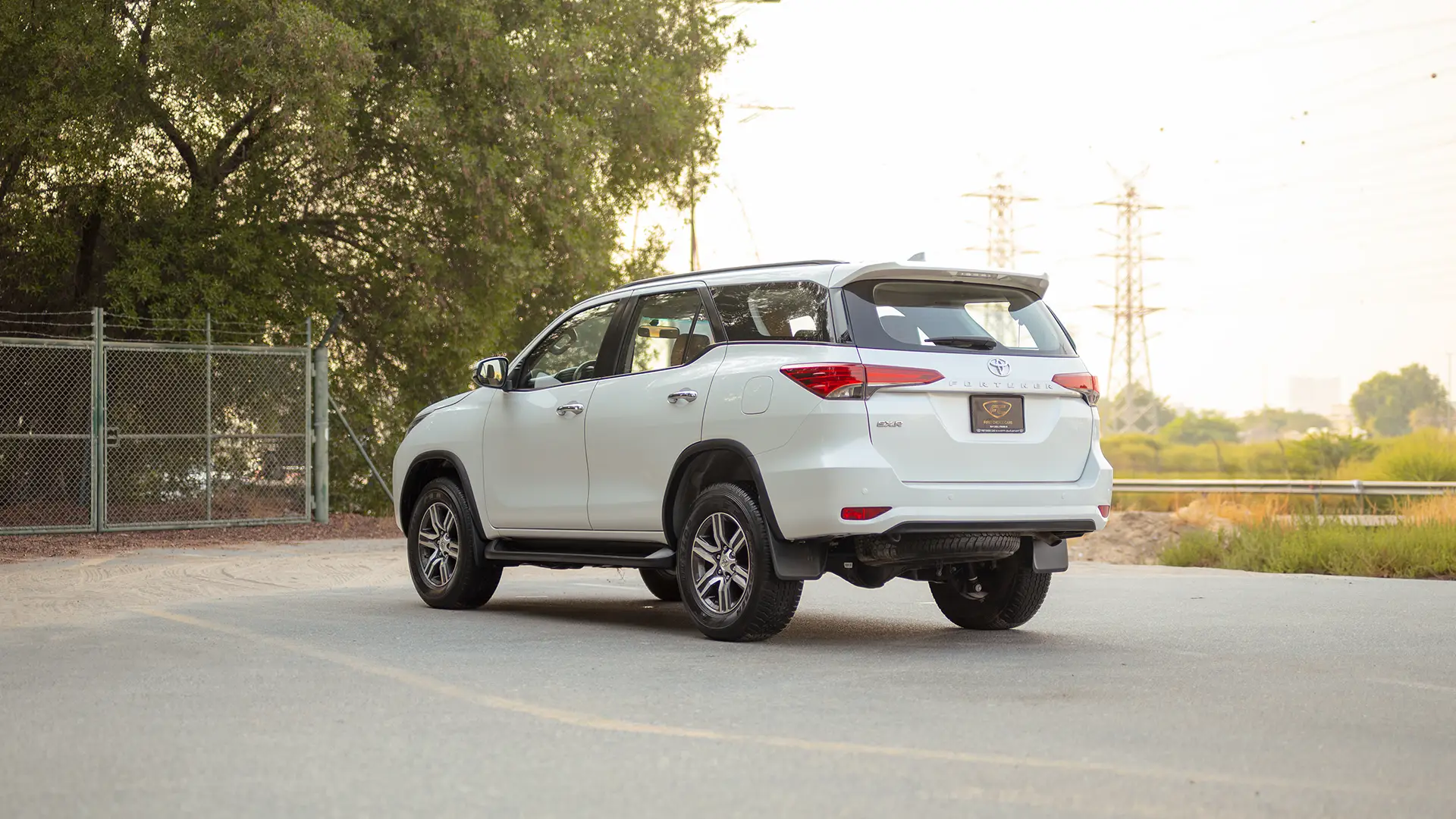 Used 2025 Toyota Fortuner EXR in White – Left Back Diagonal (45°) View for Sale at First Choice Cars Dubai Sharjah