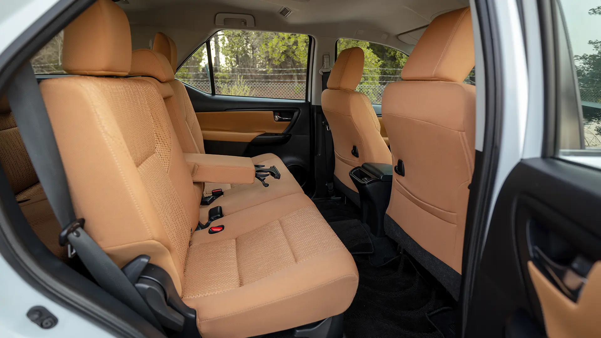 Used 2025 Toyota Fortuner EXR in White – Rear Passenger Side Cabin View for Sale at First Choice Cars Dubai Sharjah