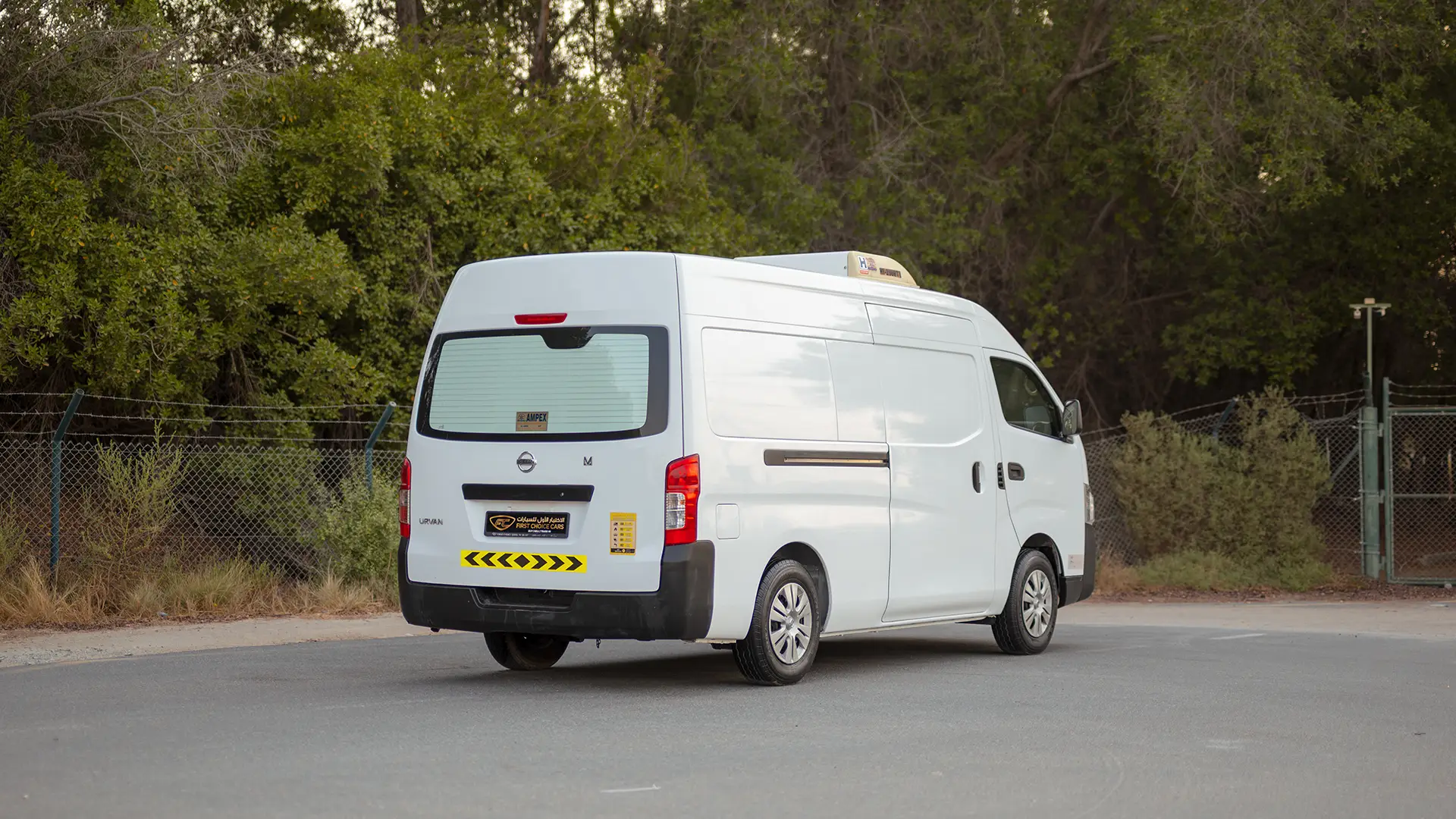 Used 2022 Nissan Urvan High Roof in White – Right Back Diagonal (45°) View for Sale at First Choice Cars Dubai Sharjah