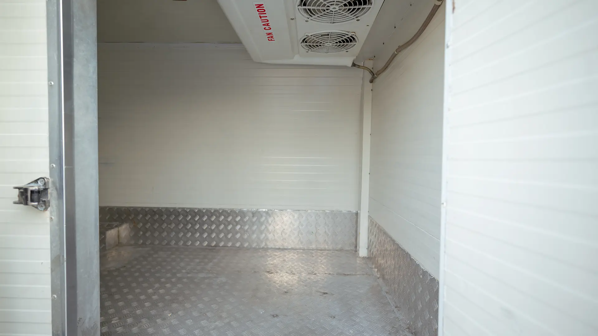 Used 2022 Nissan Urvan High Roof in White – Freezer Box Right Side Interior View for Sale at First Choice Cars Dubai Sharjah