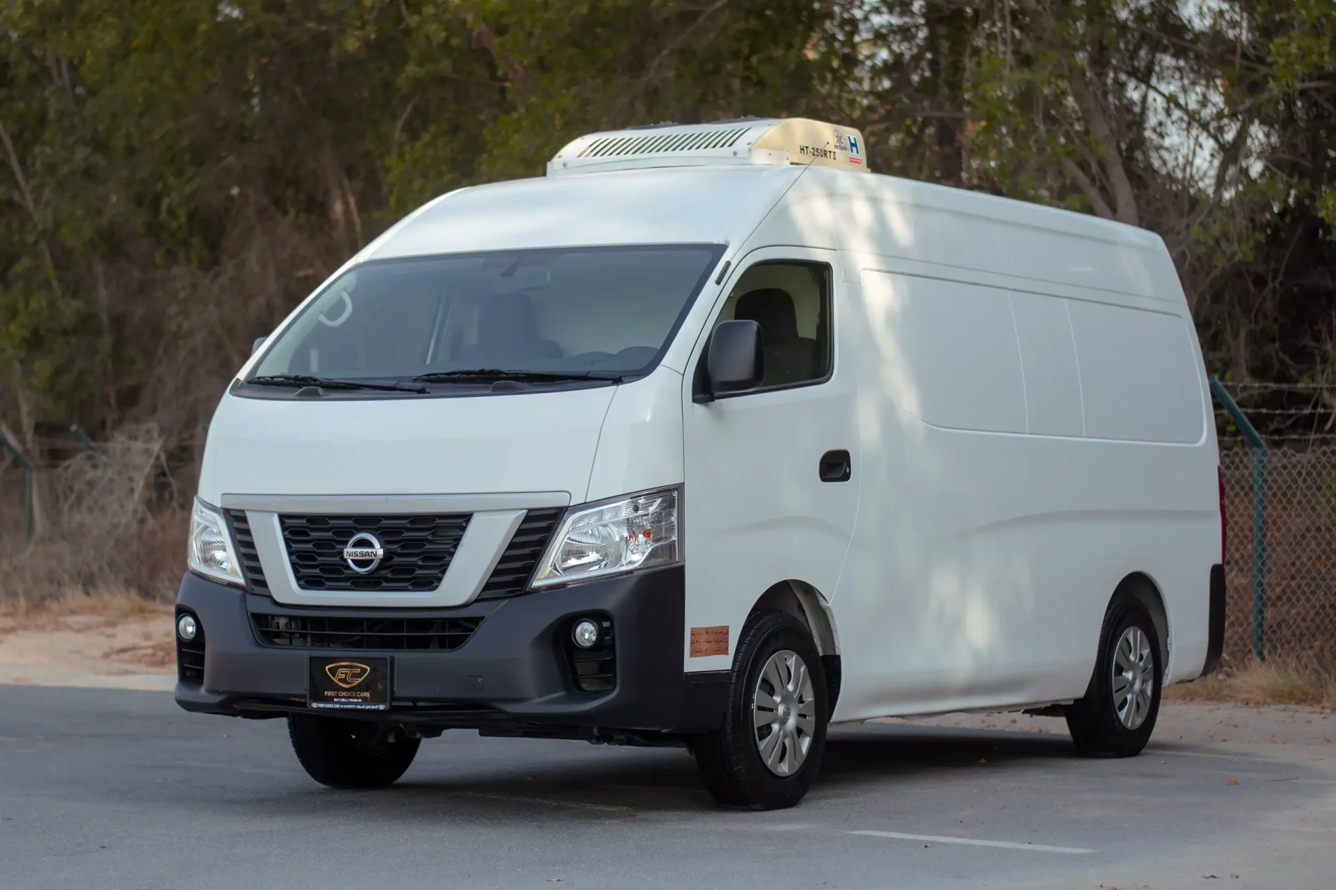 Used 2022 Nissan Urvan High Roof in White – Left Front Diagonal (45°) View for Sale at First Choice Cars Dubai Sharjah