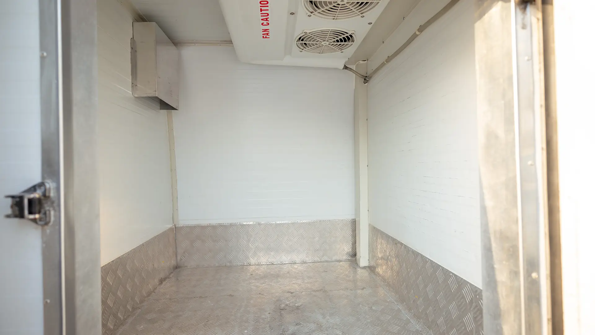 Used 2022 Nissan Urvan High Roof in White – Freezer Box Right Side Interior View for Sale at First Choice Cars Dubai Sharjah