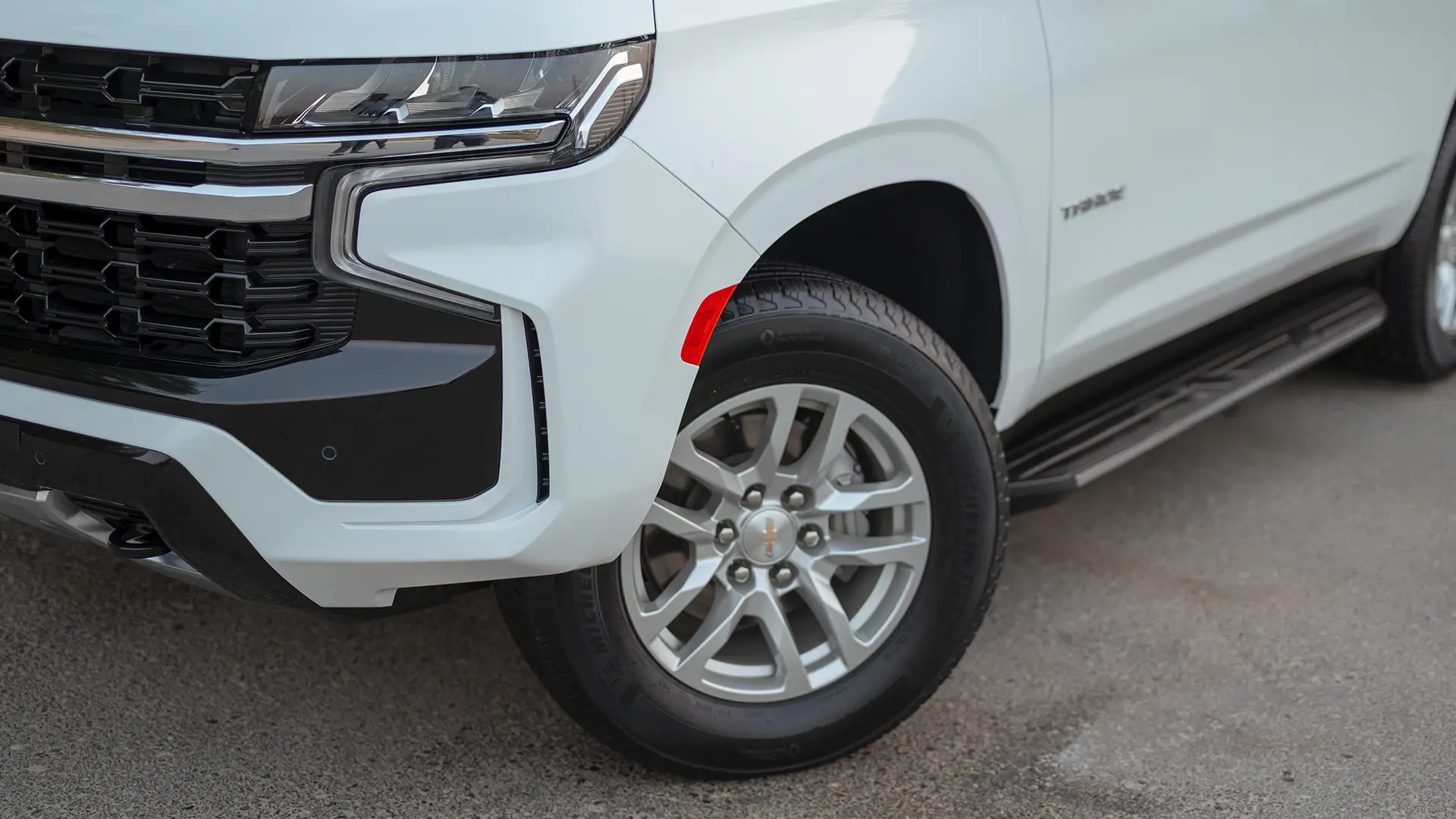 Used 2024 Chevrolet Tahoe LS in White – Headlight Close-up for Sale at First Choice Cars Dubai Sharjah