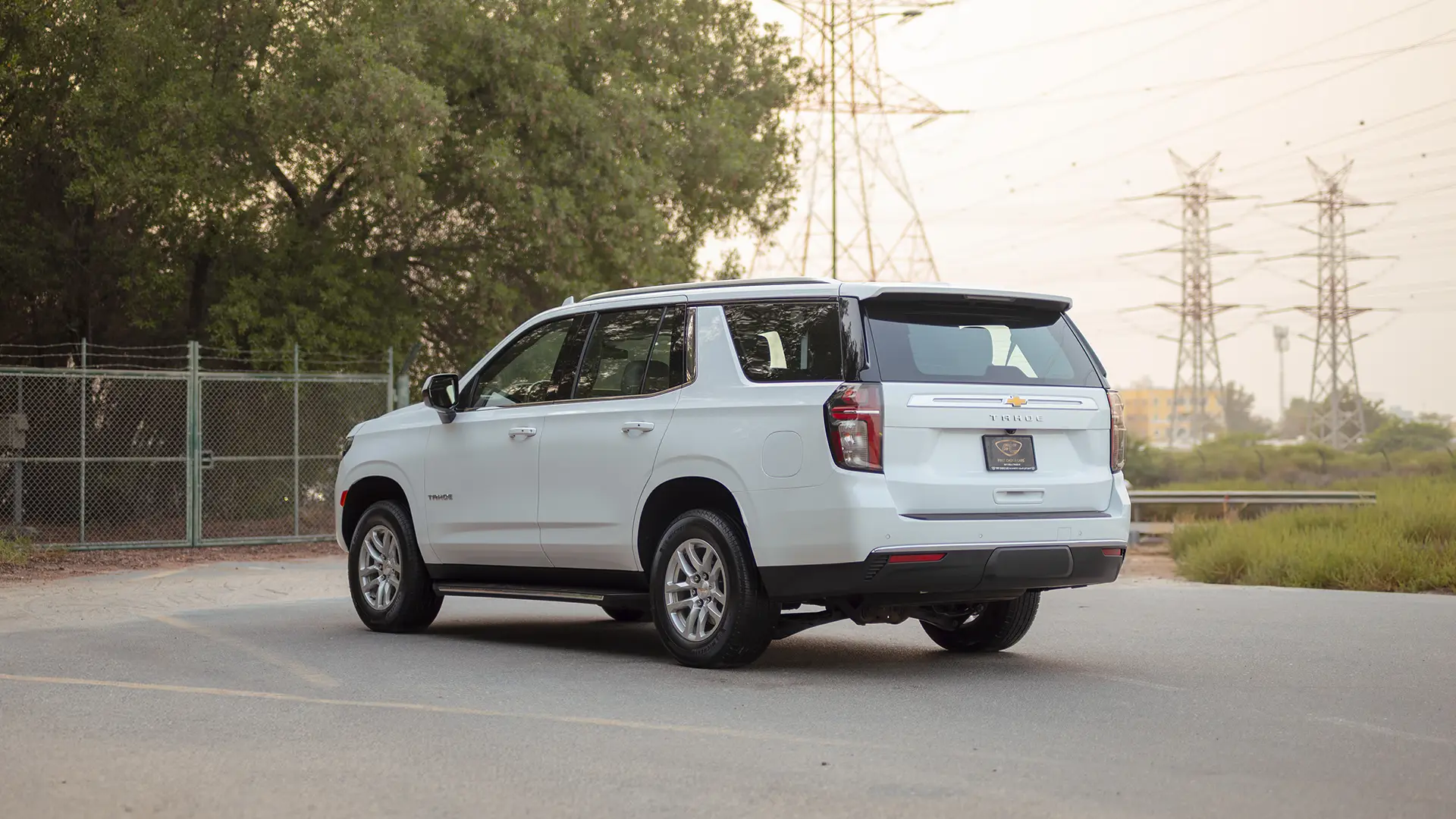 Used 2024 Chevrolet Tahoe LS in White – Left Back Diagonal (45°) View for Sale at First Choice Cars Dubai Sharjah