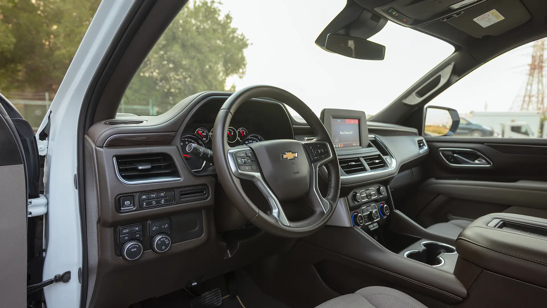 Used 2024 Chevrolet Tahoe LS in White – Driver Side Dashboard & Steering View for Sale at First Choice Cars Dubai Sharjah
