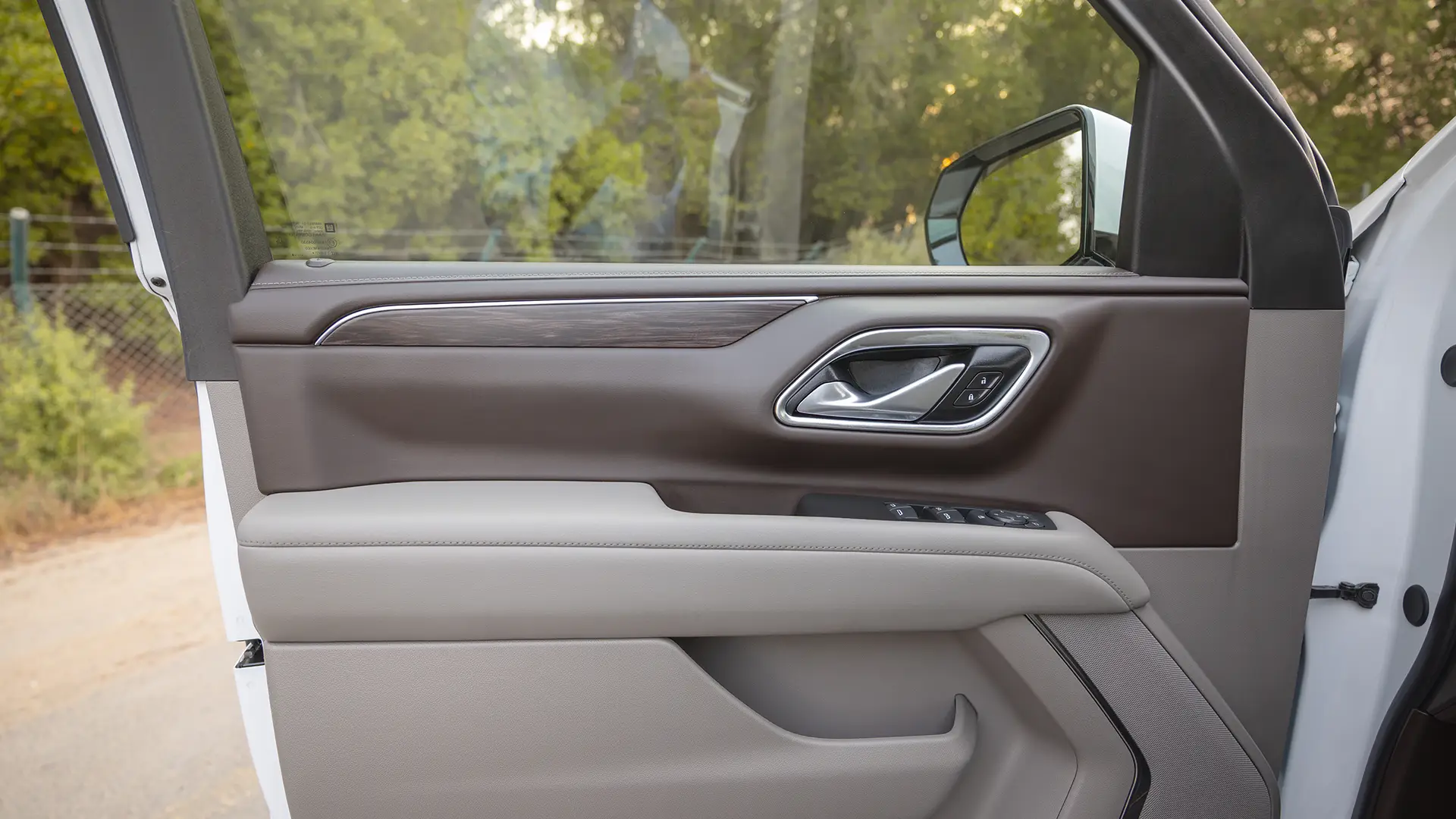 Used 2024 Chevrolet Tahoe LS in White – Driver Door Panel Full View for Sale at First Choice Cars Dubai Sharjah