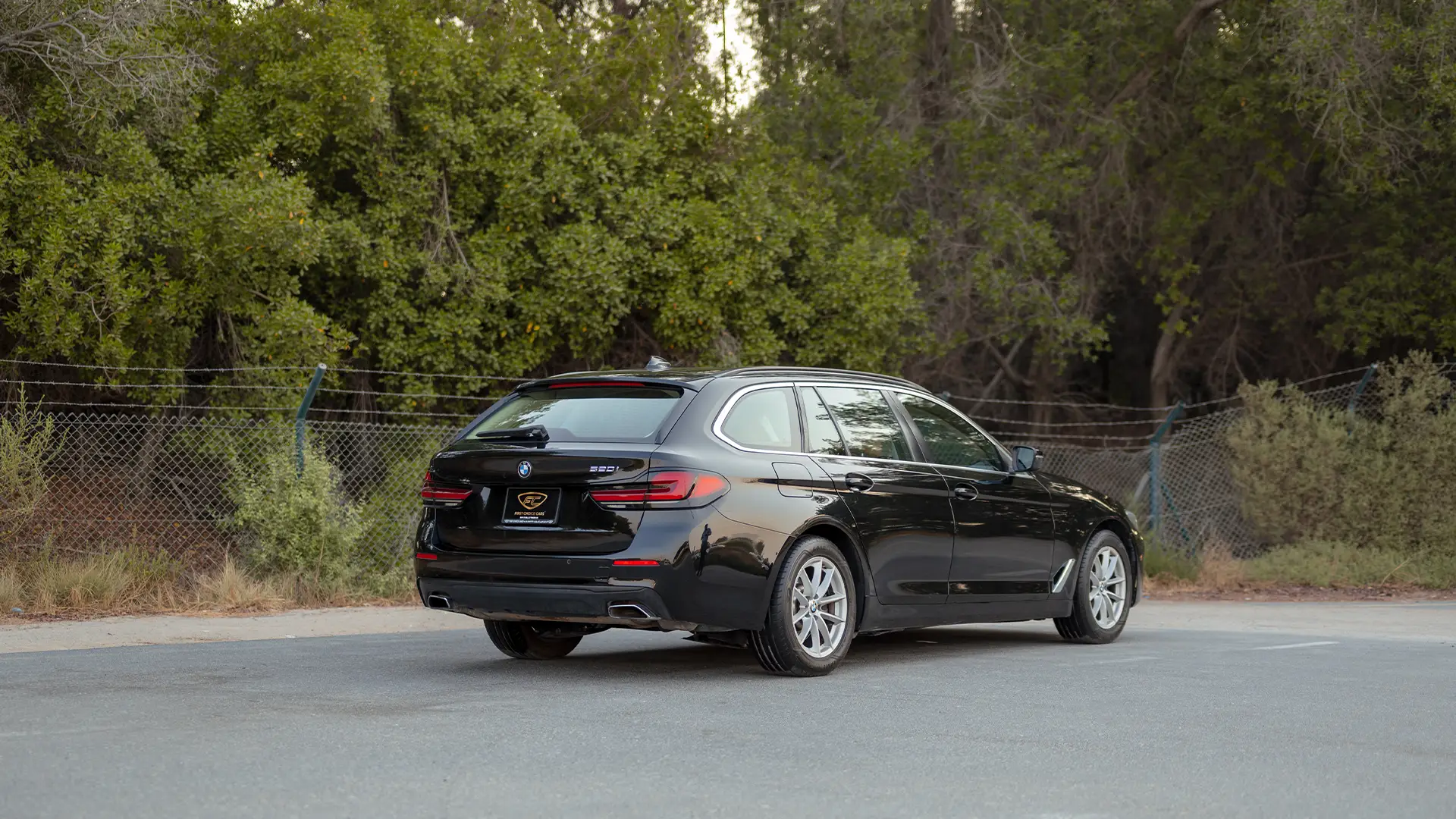 Used 2023 BMW 5-Series 520i in Black – Right Back Diagonal (45°) View for Sale at First Choice Cars Dubai Sharjah