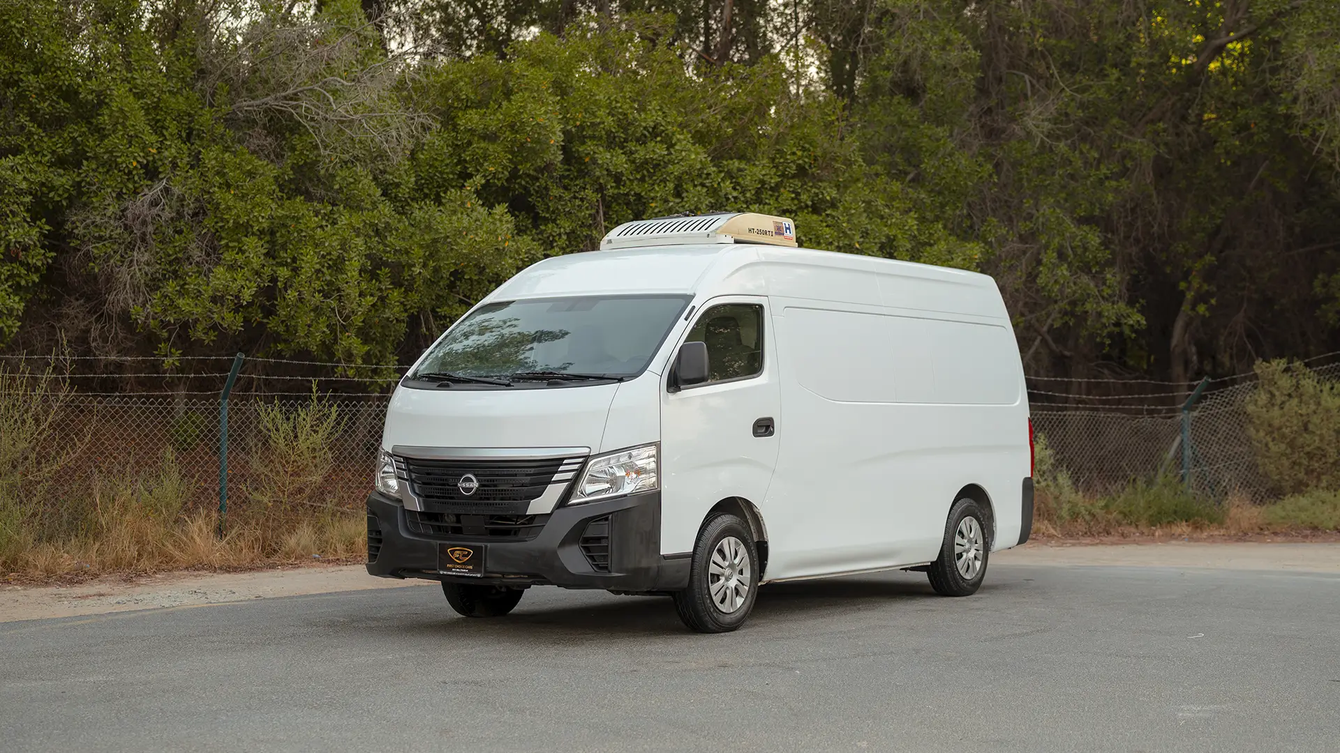 Used 2023 Nissan Urvan High Roof in White – Left Front Diagonal (45°) View for Sale at First Choice Cars Dubai Sharjah