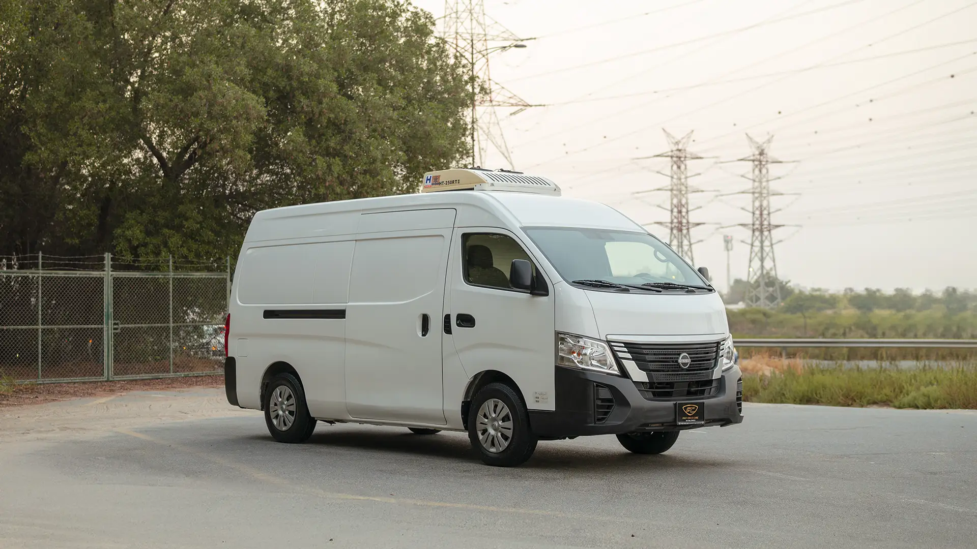 Used 2023 Nissan Urvan High Roof in White – Right Front Diagonal (45°) View for Sale at First Choice Cars Dubai Sharjah