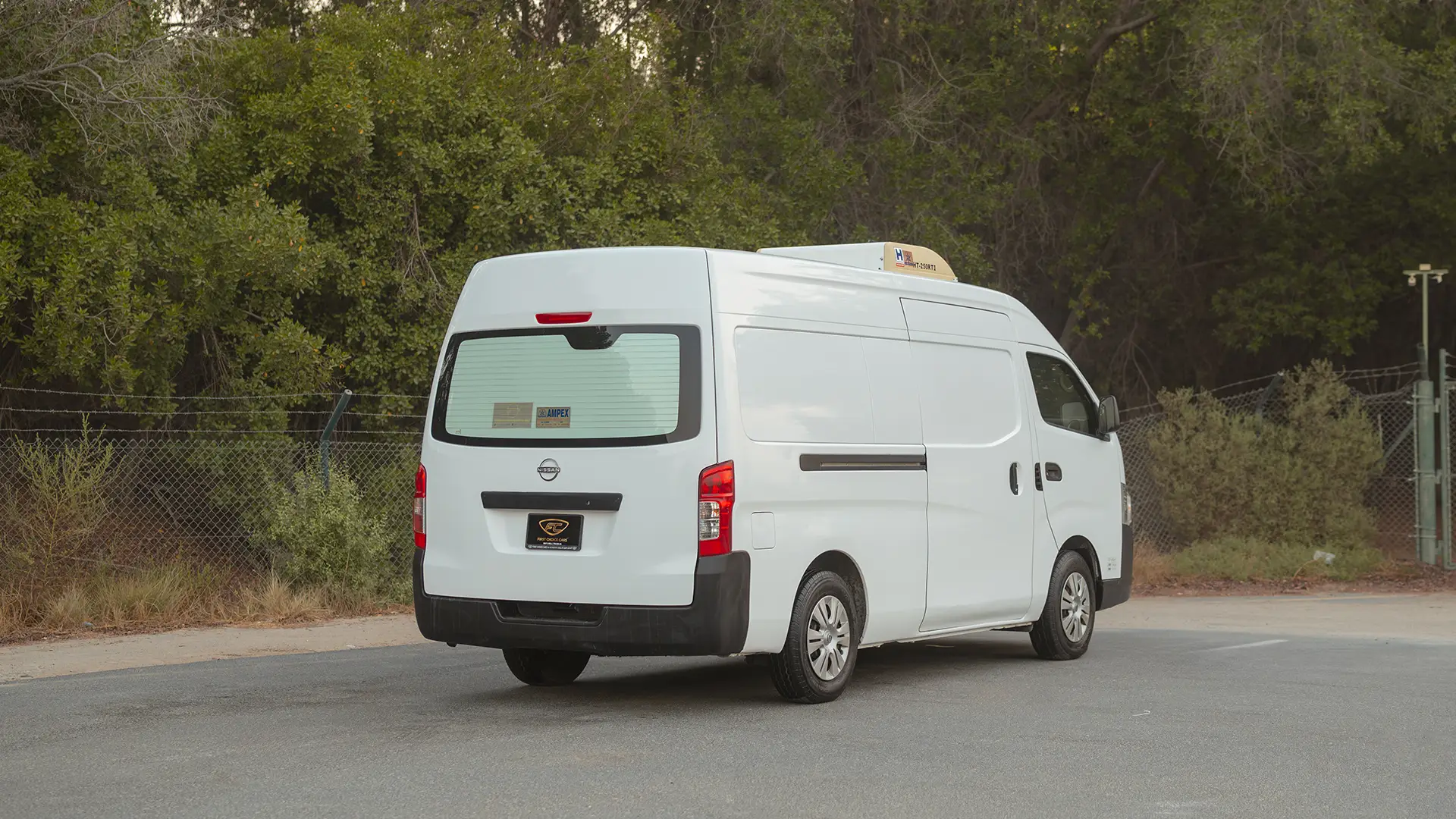 Used 2023 Nissan Urvan High Roof in White – Right Back Diagonal (45°) View for Sale at First Choice Cars Dubai Sharjah