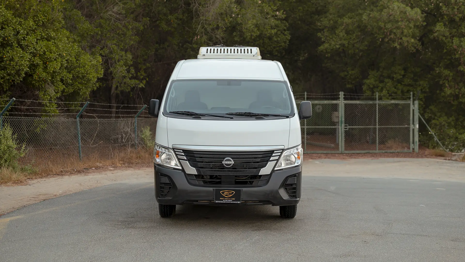 Used 2023 Nissan Urvan High Roof in White – Front View for Sale at First Choice Cars Dubai Sharjah