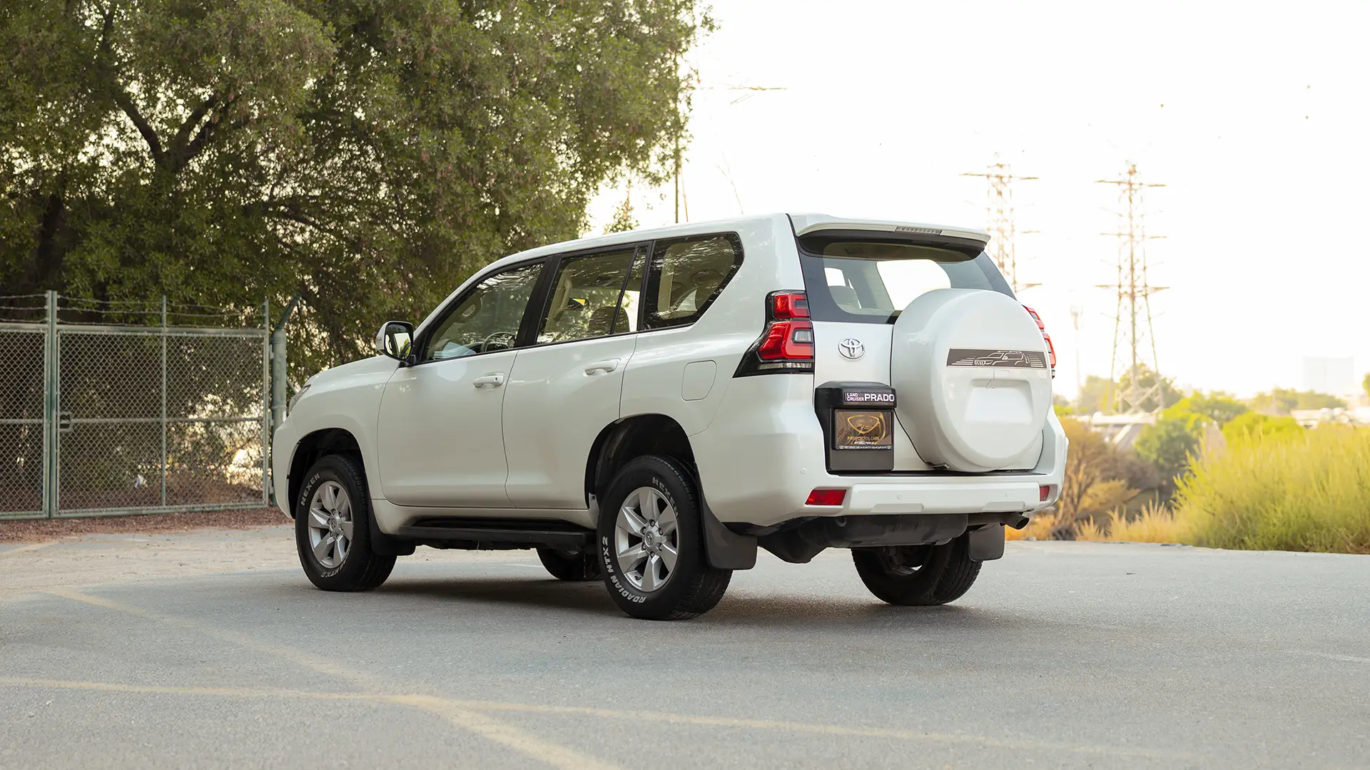 Used 2022 Toyota Prado EXR in White – Left Back Diagonal (45°) View for Sale at First Choice Cars Dubai Sharjah