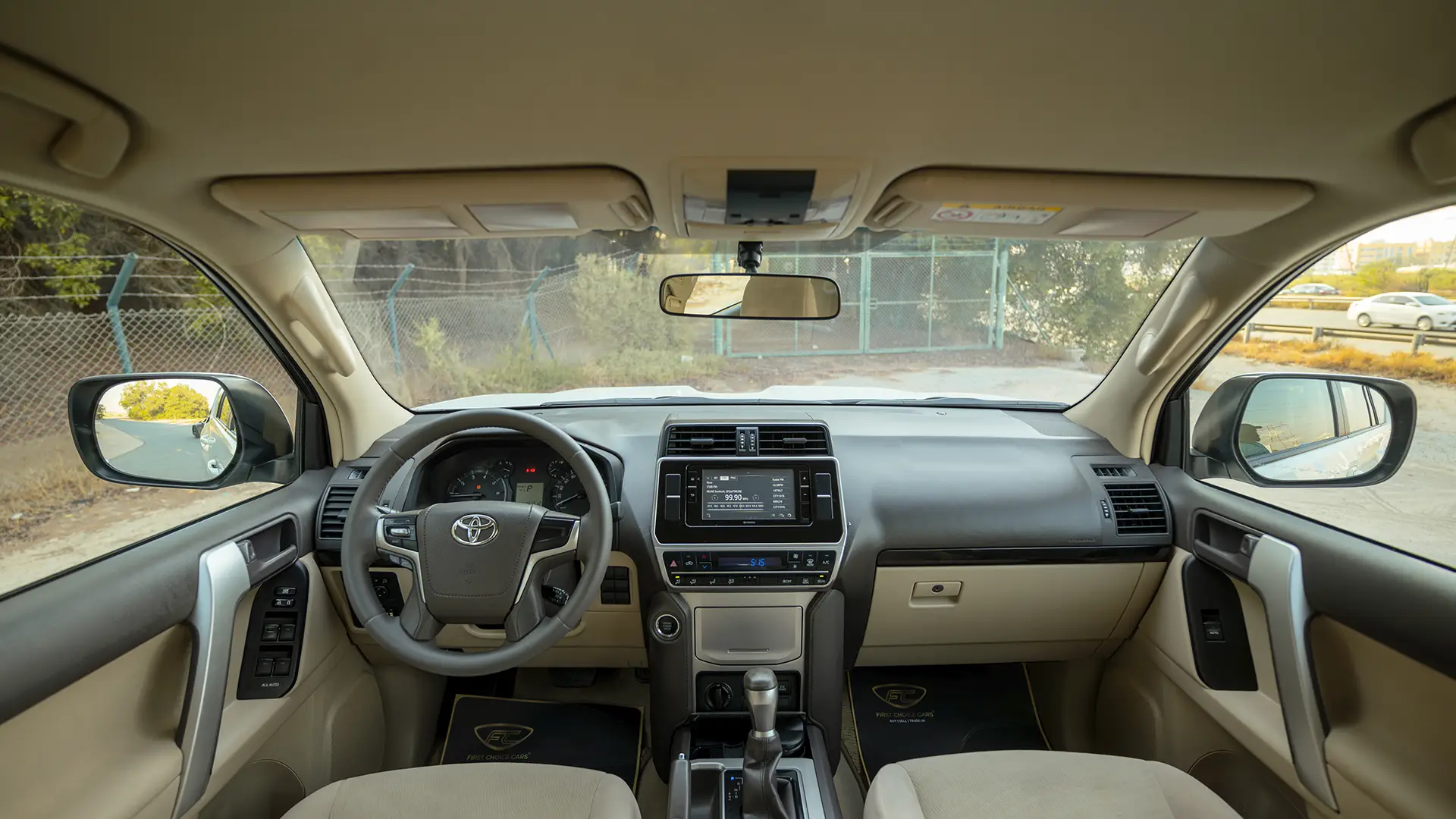 Used 2022 Toyota Prado EXR in White – Front Cabin / Dashboard Full View for Sale at First Choice Cars Dubai Sharjah