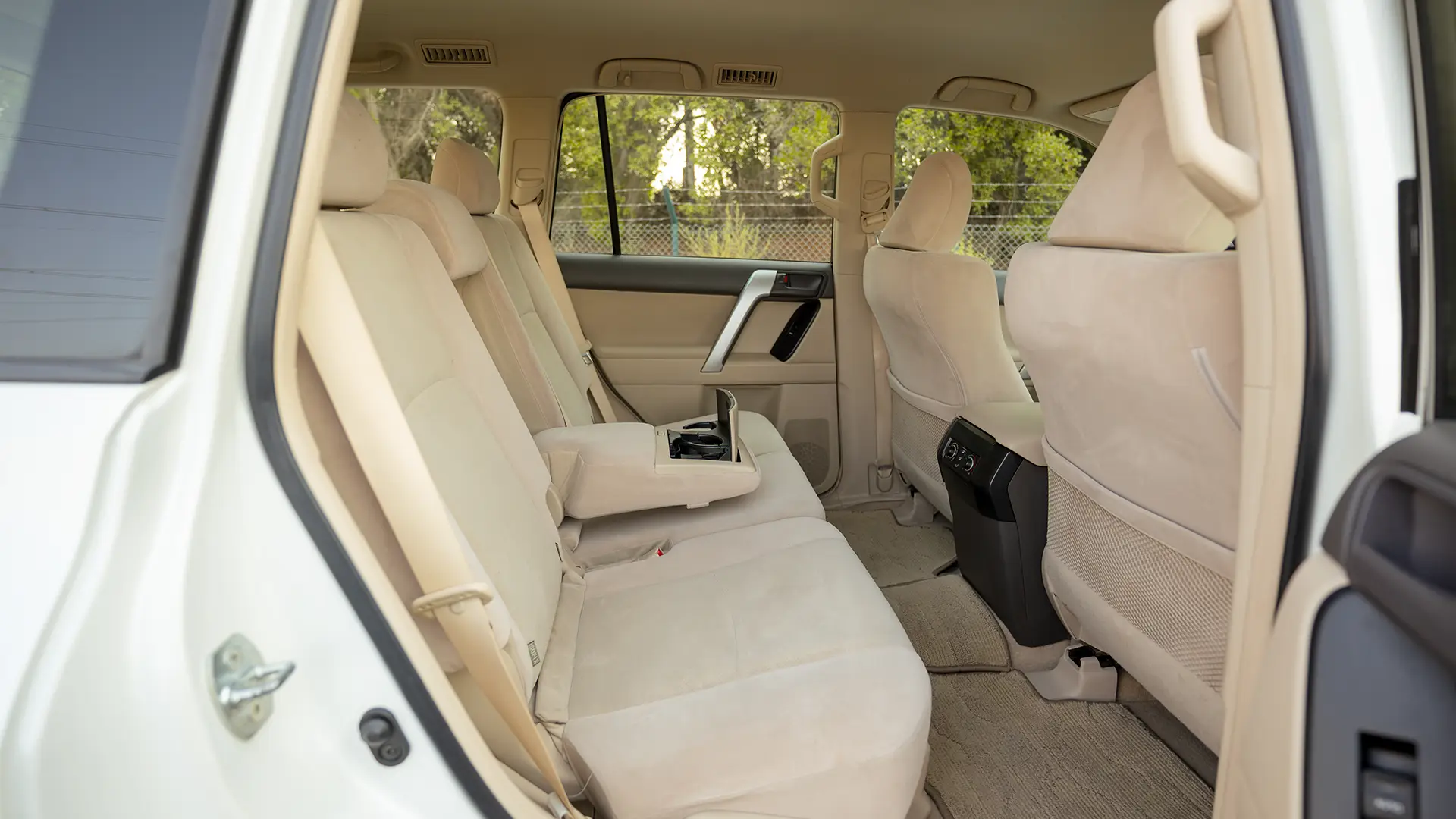 Used 2022 Toyota Prado EXR in White – Rear Passenger Side Cabin View for Sale at First Choice Cars Dubai Sharjah