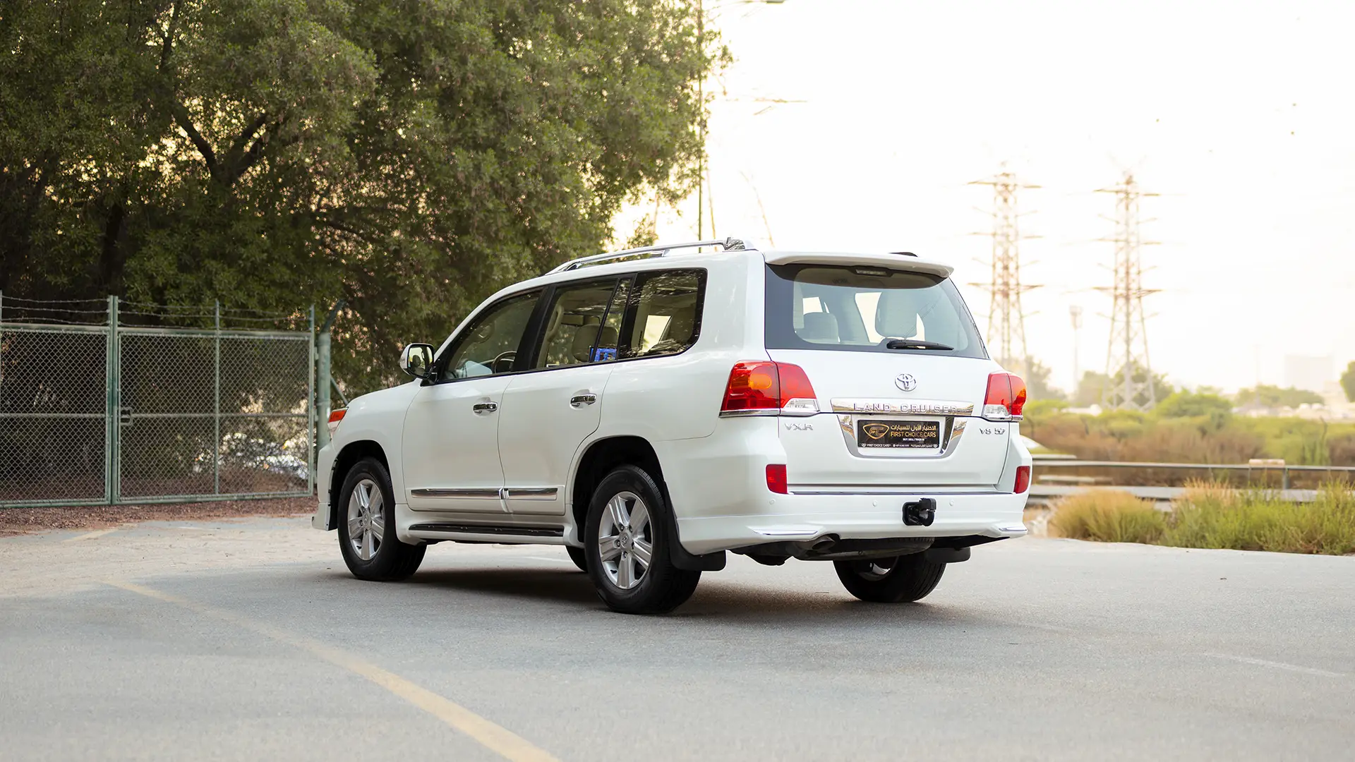 Used 2014 Toyota Land Cruiser VXR in White – Left Back Diagonal (45°) View for Sale at First Choice Cars Dubai Sharjah