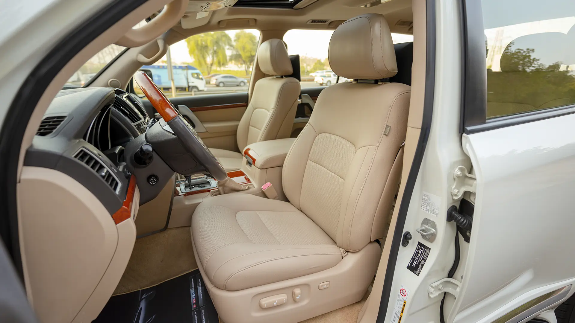 Used 2014 Toyota Land Cruiser VXR in White – Front Driver Side Cabin View for Sale at First Choice Cars Dubai Sharjah